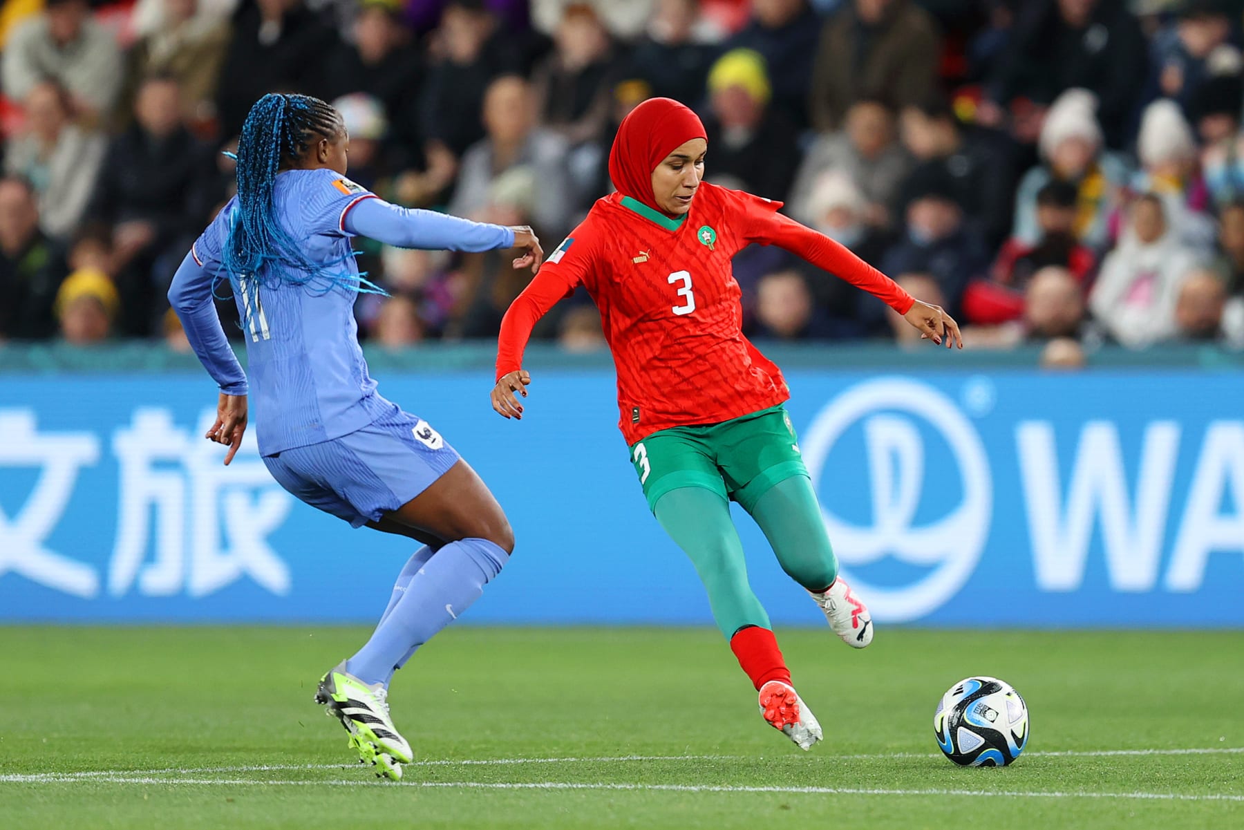 ADELAIDE, AUSTRALIA - AUGUST 08: Nouhaila Benzina of Morocco takes on Kadidiatou Diani of France during the FIFA Women's World Cup Australia & New Zealand 2023 Round of 16 match between France and Morocco at Hindmarsh Stadium on August 08, 2023 in Adelaide / Tarntanya, Australia. (Photo by Brendon Thorne - FIFA/FIFA via Getty Images)