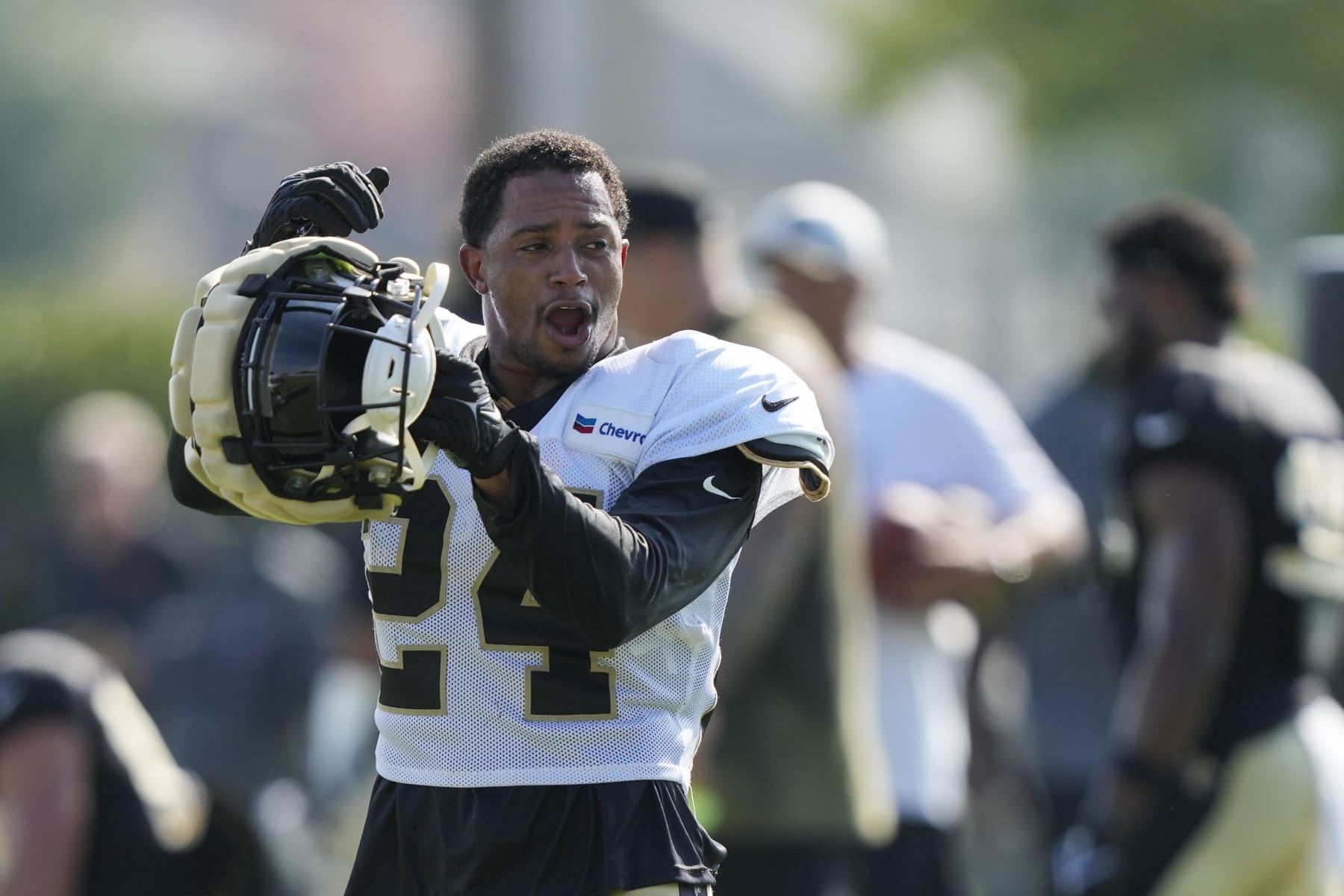 New Orleans Saints safety Johnathan Abram (24) reacts after stretches at the NFL team's football training camp in Metairie, La., Tuesday, Aug. 1, 2023. (AP Photo/Gerald Herbert)