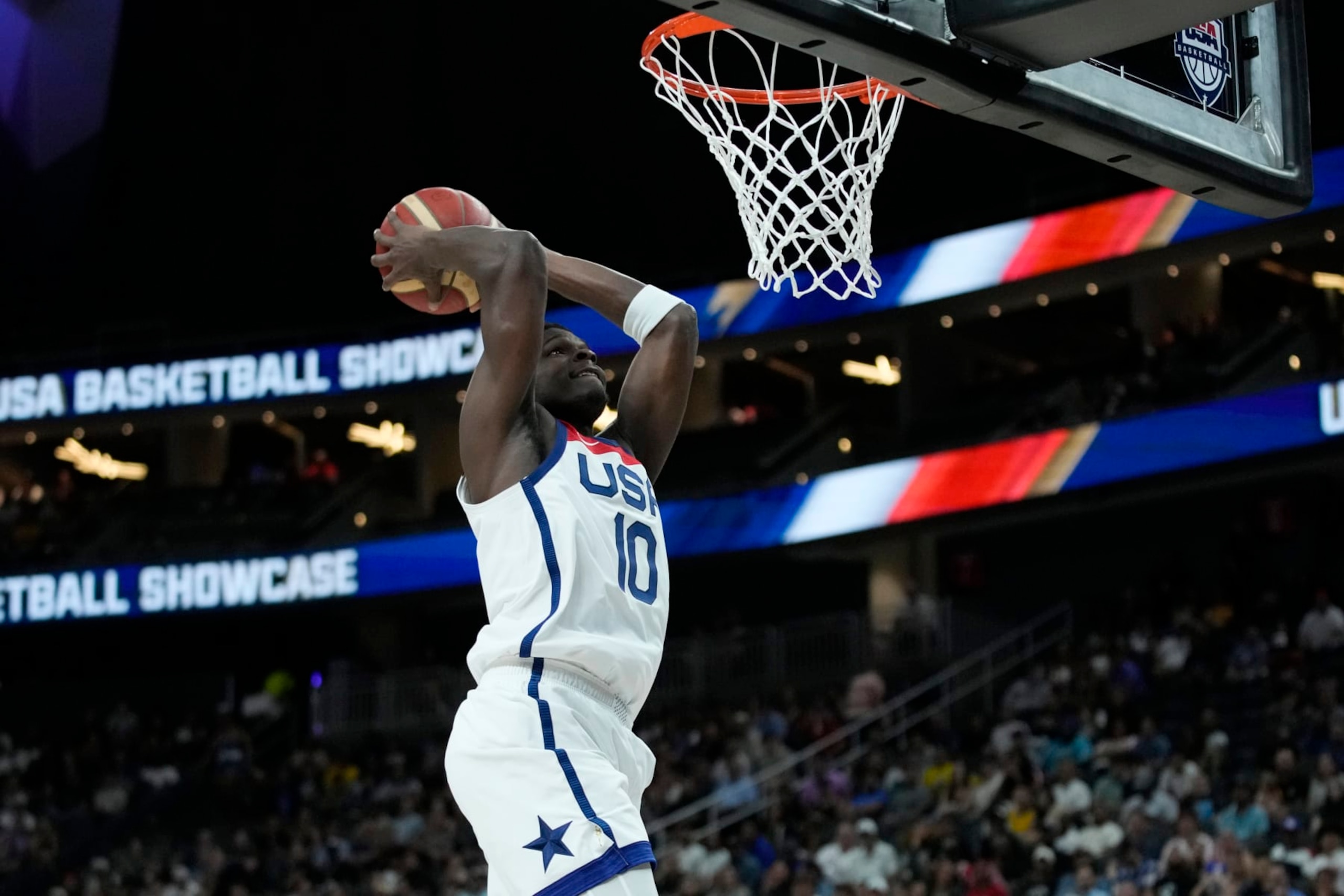 United States' Anthony Edwards dunks against Puerto Rico during the first half of an exhibition basketball game Monday, Aug. 7, 2023, in Las Vegas. (AP Photo/John Locher)