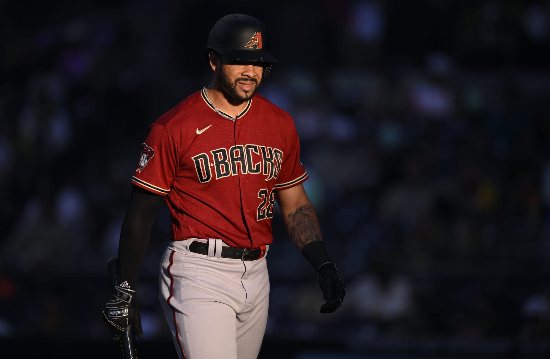SAN DIEGO, CALIFORNIA - AUGUST 18: Tommy Pham #28 of the Arizona Diamondbacks looks on during the first inning against the San Diego Padres at PETCO Park on August 18, 2023 in San Diego, California. (Photo by Orlando Ramirez/Getty Images)