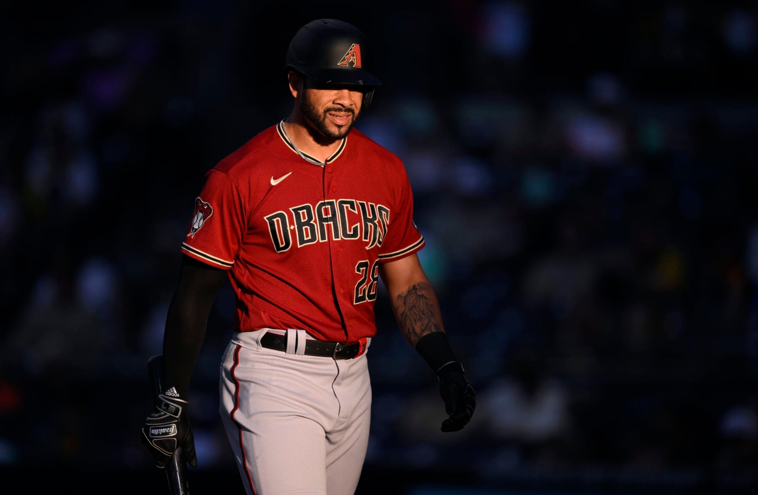 SAN DIEGO, CALIFORNIA - AUGUST 18: Tommy Pham #28 of the Arizona Diamondbacks looks on during the first inning against the San Diego Padres at PETCO Park on August 18, 2023 in San Diego, California. (Photo by Orlando Ramirez/Getty Images)