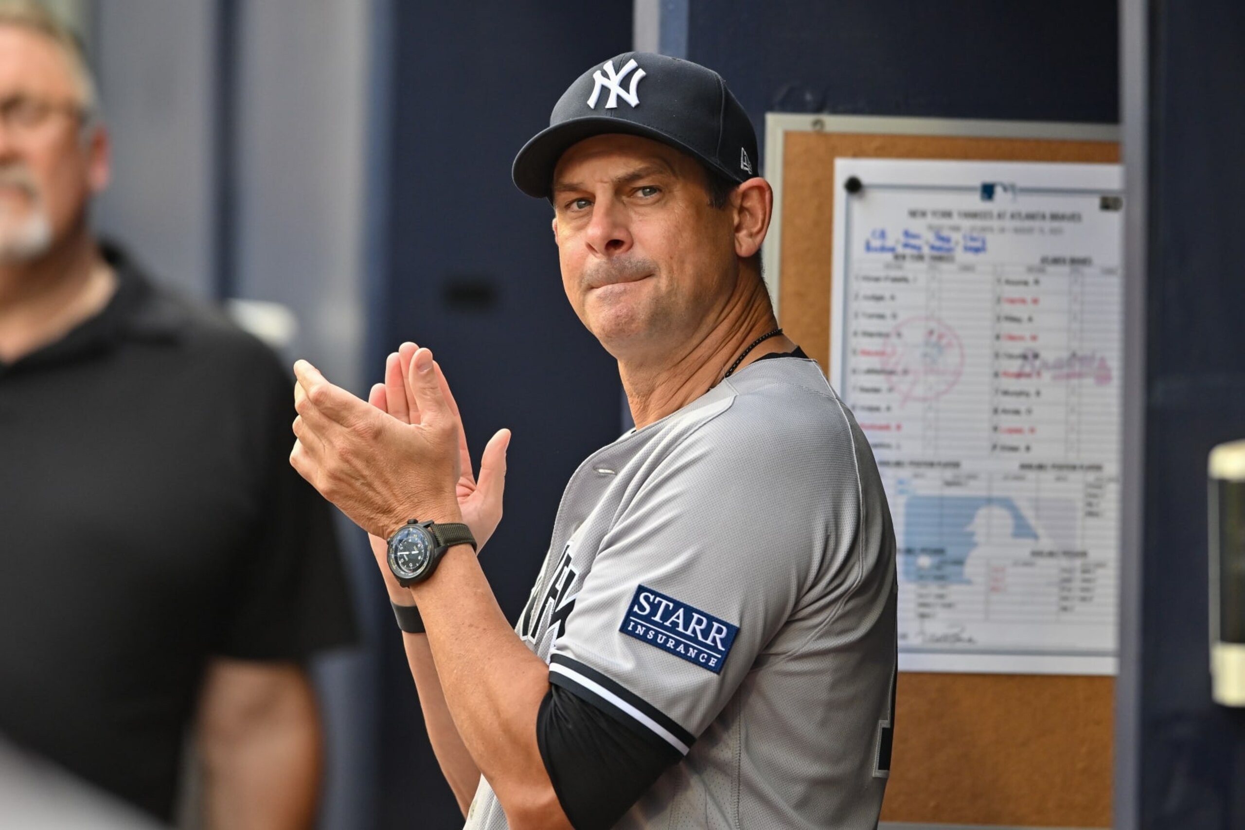 ATLANTA, GA  AUGUST 15:  New York manager Aaron Boone (17) reacts in the dugout during the MLB game between the New York Yankees and the Atlanta Braves on August 15th, 2023 at Truist Park in Atlanta, GA. (Photo by Rich von Biberstein/Icon Sportswire via Getty Images)