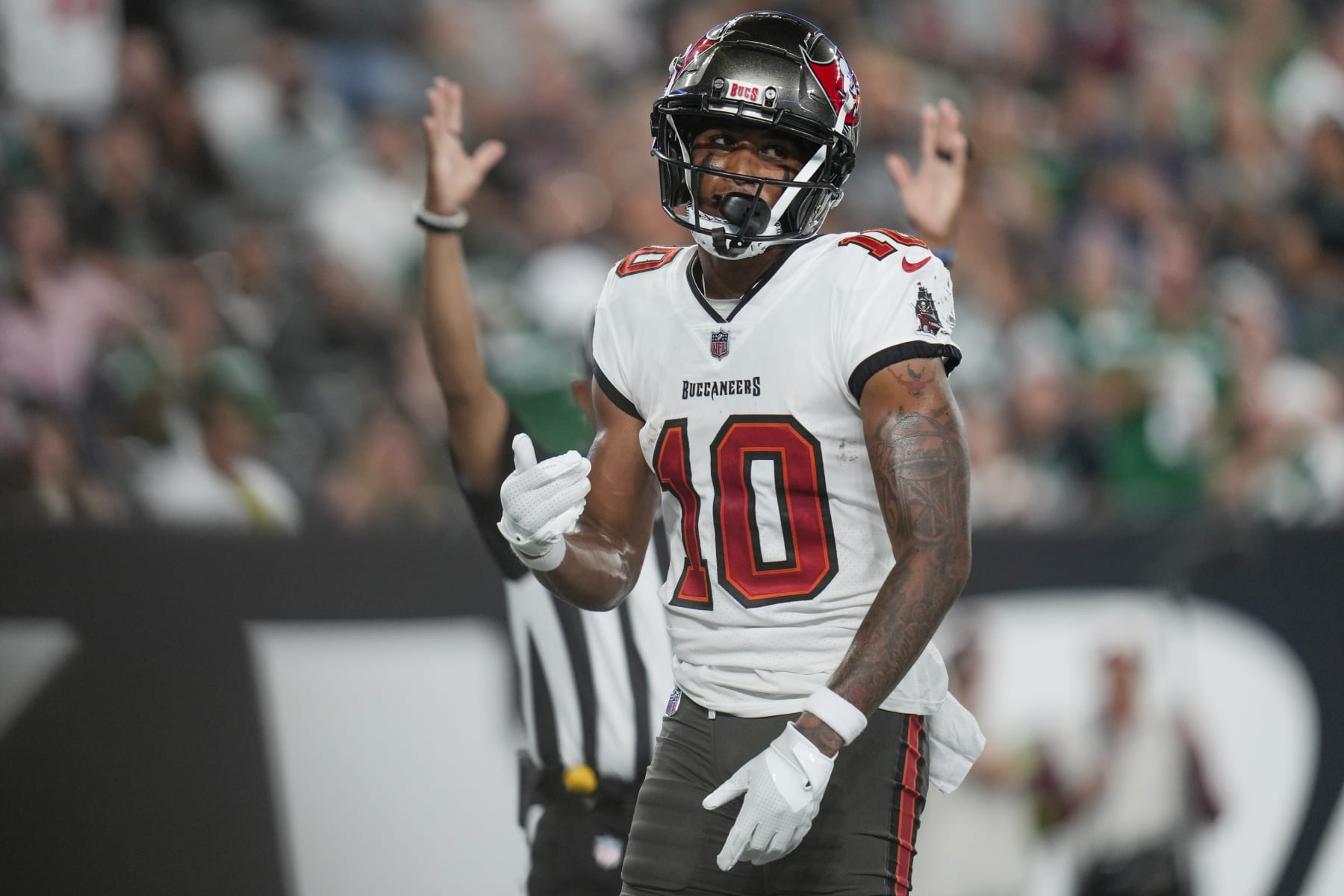 Tampa Bay Buccaneers wide receiver Trey Palmer (10) reacts after catching a pass for a touchdown during the first half of a preseason NFL football game against the New York Jets, Saturday, Aug. 19, 2023, in East Rutherford, N.J. (AP Photo/Seth Wenig)