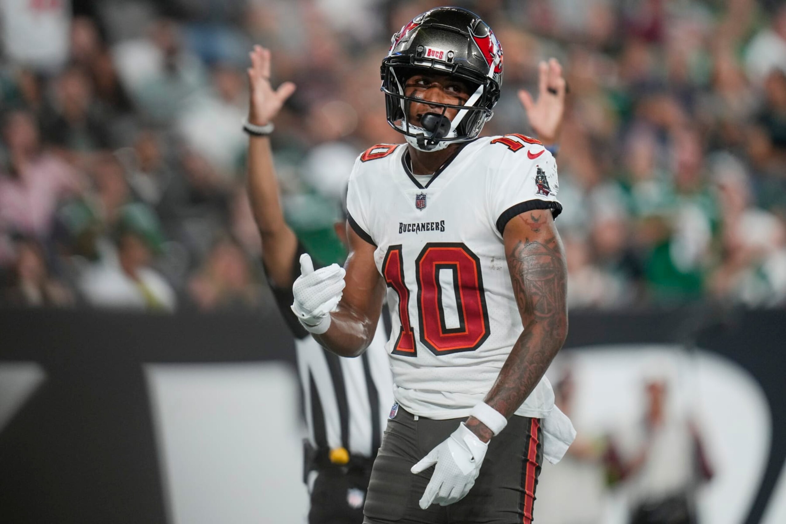 Tampa Bay Buccaneers wide receiver Trey Palmer (10) reacts after catching a pass for a touchdown during the first half of a preseason NFL football game against the New York Jets, Saturday, Aug. 19, 2023, in East Rutherford, N.J. (AP Photo/Seth Wenig)