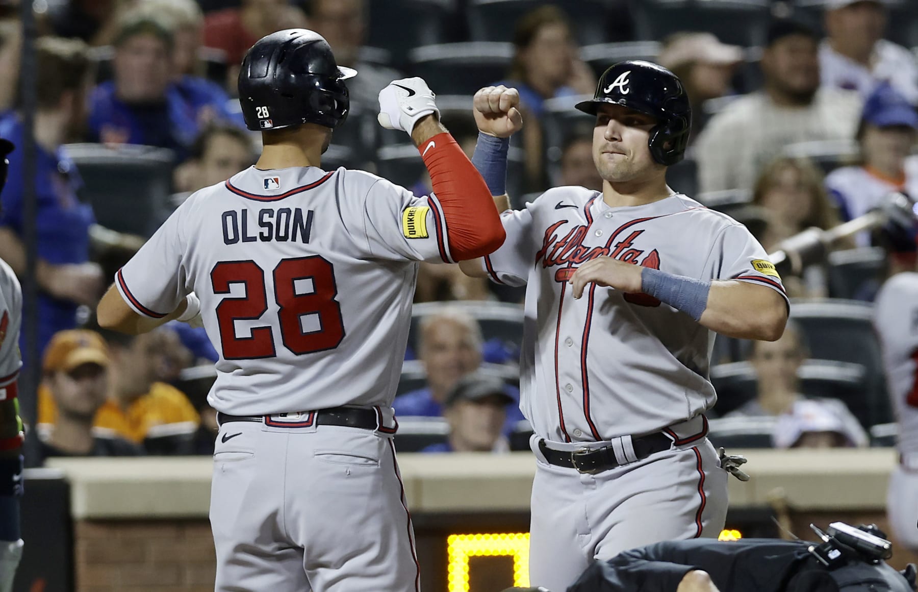 NEW YORK, NEW YORK - AUGUST 13:  Matt Olson #28 of the Atlanta Braves celebrates his eighth inning two-run home run against the New York Mets with teammate Austin Riley #27 at Citi Field on August 13, 2023 in New York City. (Photo by Jim McIsaac/Getty Images)