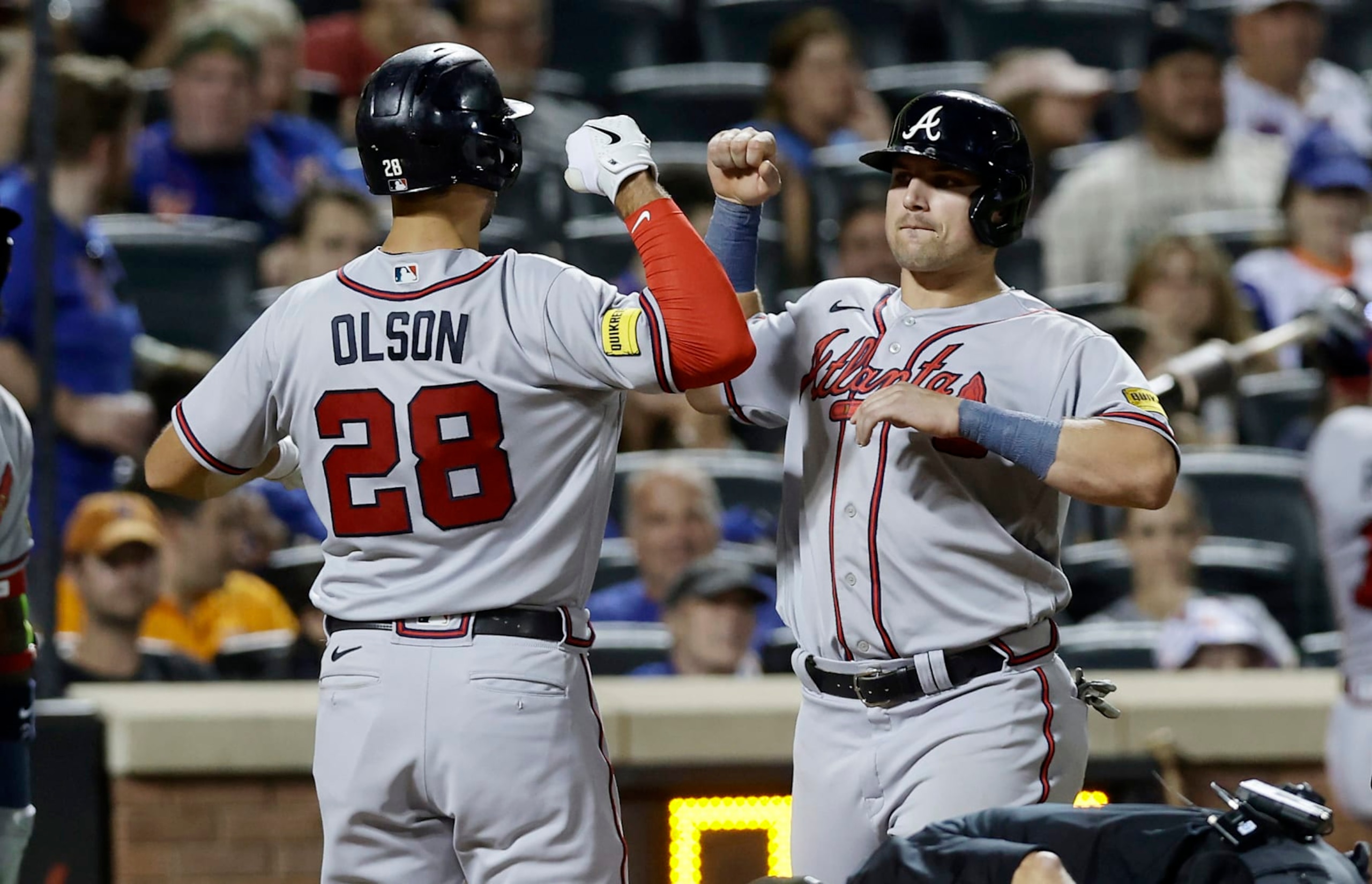 NEW YORK, NEW YORK - AUGUST 13:  Matt Olson #28 of the Atlanta Braves celebrates his eighth inning two-run home run against the New York Mets with teammate Austin Riley #27 at Citi Field on August 13, 2023 in New York City. (Photo by Jim McIsaac/Getty Images)