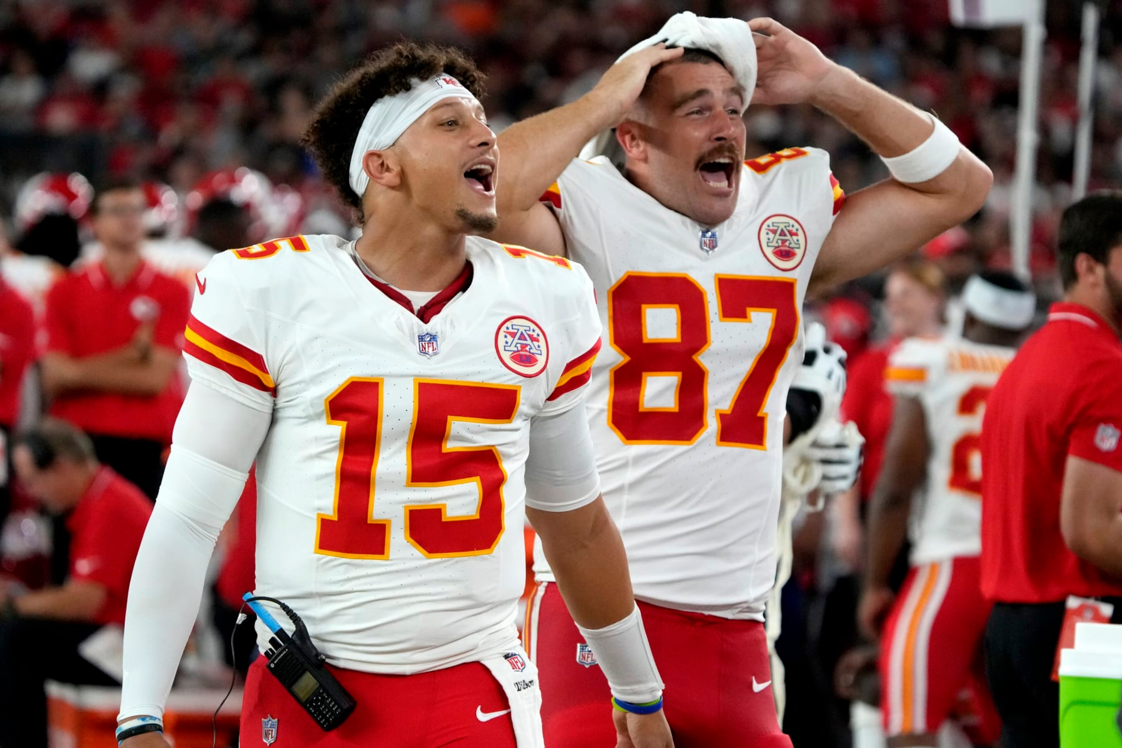 Kansas City Chiefs quarterback Patrick Mahomes (15) and tight end Travis Kelce (87) cheer from the sidelines during the first half of an NFL preseason football game against the Arizona Cardinals, Saturday, Aug. 19, 2023, in Glendale, Ariz. (AP Photo/Rick Scuteri) Kansas City Chiefs quarterback Patrick Mahomes (15) and tight end Travis Kelce (87) cheer from the sidelines during the first half of an NFL preseason football game against the Arizona Cardinals, Saturday, Aug. 19, 2023, in Glendale, Ariz. (AP Photo/Rick Scuteri)