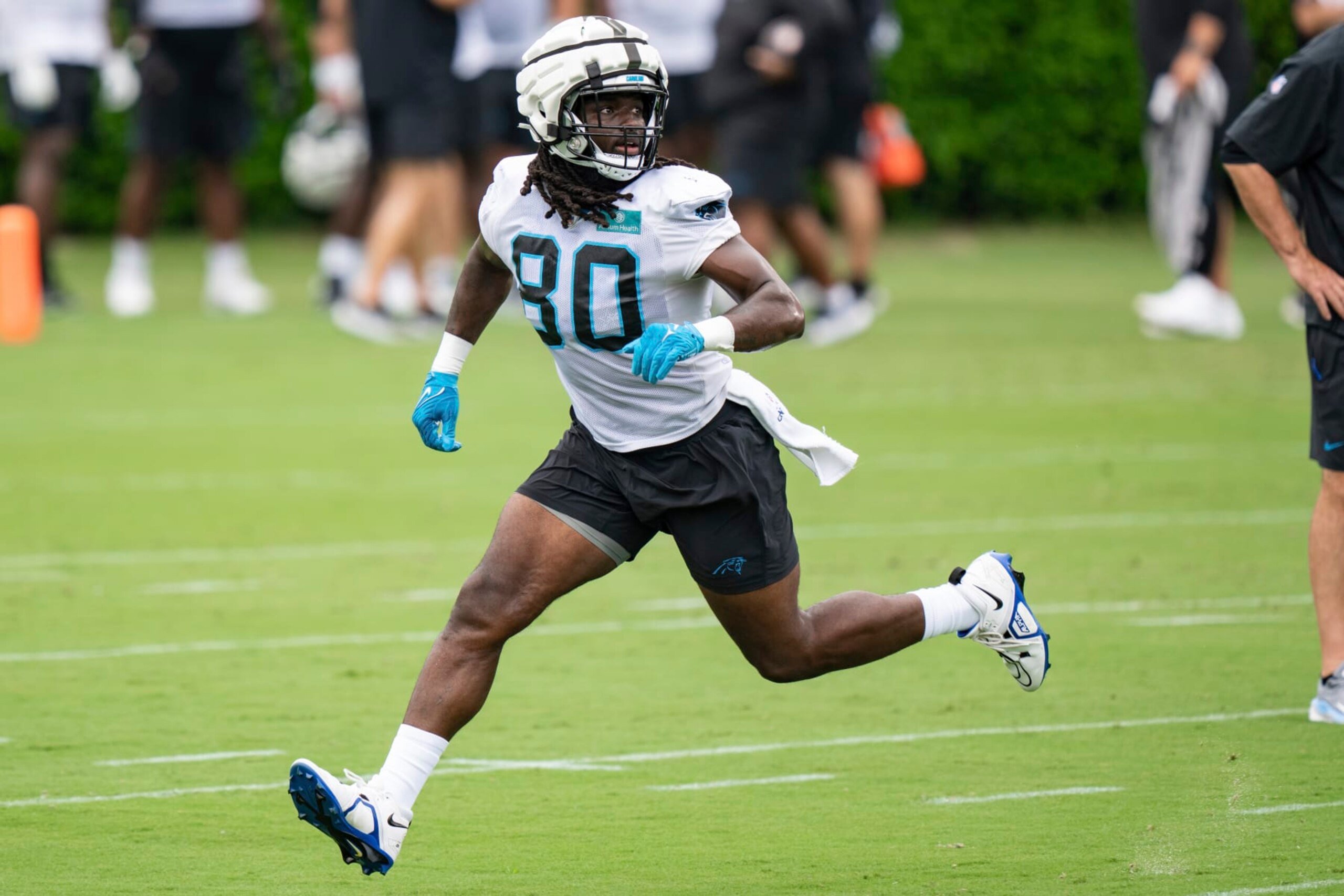 Carolina Panthers tight end Ian Thomas runs through drills at the NFL football team's training camp on Saturday, July 29, 2023, in Spartanburg, S.C. (AP Photo/Jacob Kupferman)
