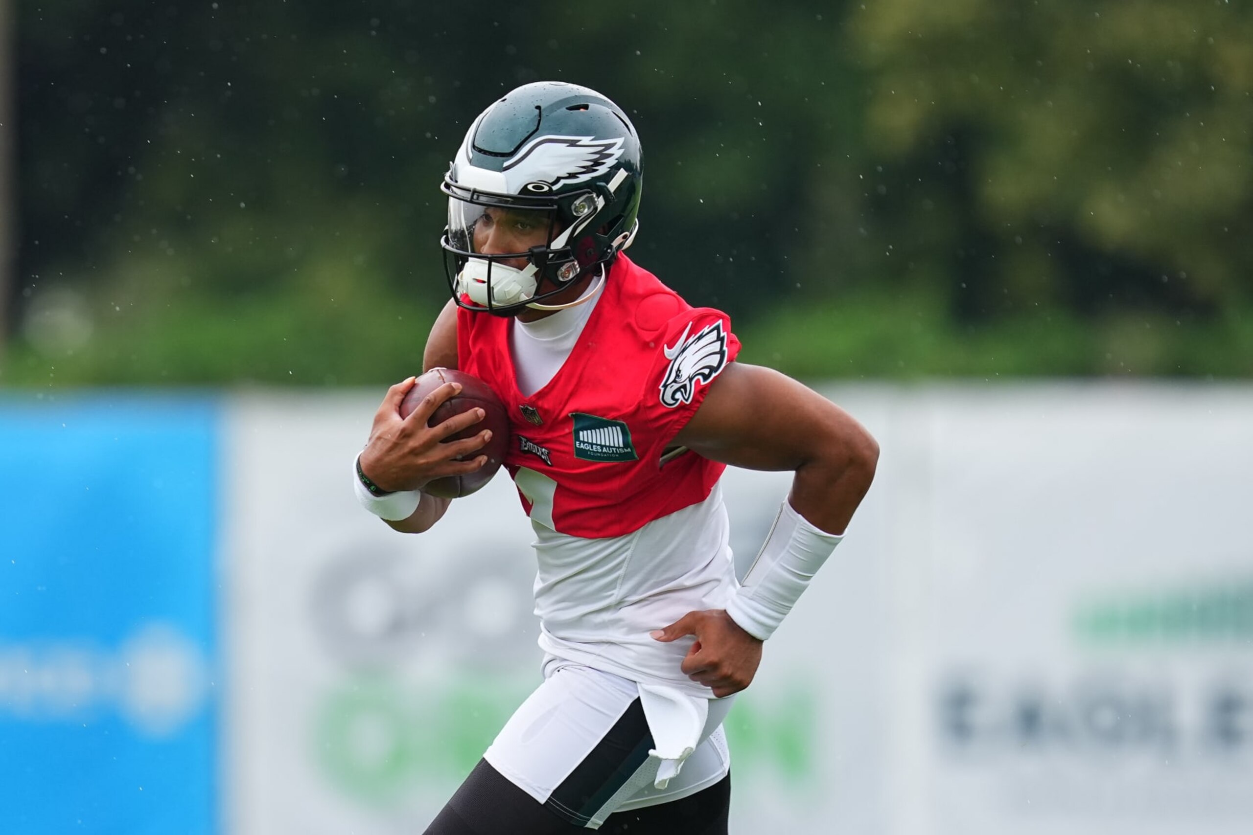 PHILADELPHIA, PENNSYLVANIA - AUGUST 10: Jalen Hurts #1 of the Philadelphia Eagles runs with the ball during Training Camp at the NovaCare Complex on August 10, 2023 in Philadelphia, Pennsylvania. (Photo by Mitchell Leff/Getty Images)