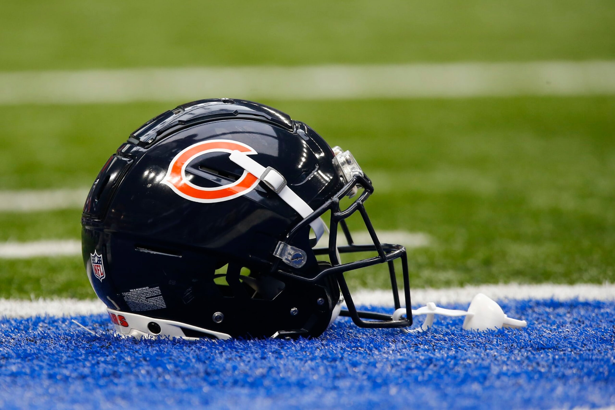 INDIANAPOLIS, IN - AUGUST 19: A Chicago Bears helmet sits on the turf prior to the start of a preseason game between the Chicago Bears and the Indianapolis Colts on August 19, 2023 at Lucas Oil Stadium in Indianapolis, IN. (Photo by Jeffrey Brown/Icon Sportswire via Getty Images)