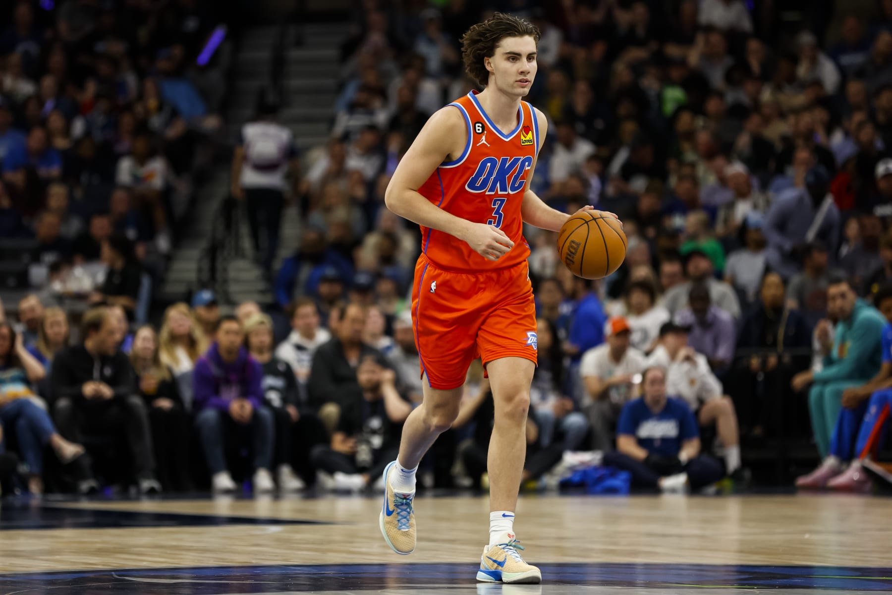 MINNEAPOLIS, MN - APRIL 14: Josh Giddey #3 of the Oklahoma City Thunder dribbles the ball against the Minnesota Timberwolves in the third quarter of the NBA Play-In game at Target Center on April 14, 2023 in Minneapolis, Minnesota. The Timberwolves defeated the Thunder 120-95 to advance to the NBA Playoffs as the #8 seed. NOTE TO USER: User expressly acknowledges and agrees that, by downloading and or using this Photograph, user is consenting to the terms and conditions of the Getty Images License Agreement. (Photo by David Berding/Getty Images)