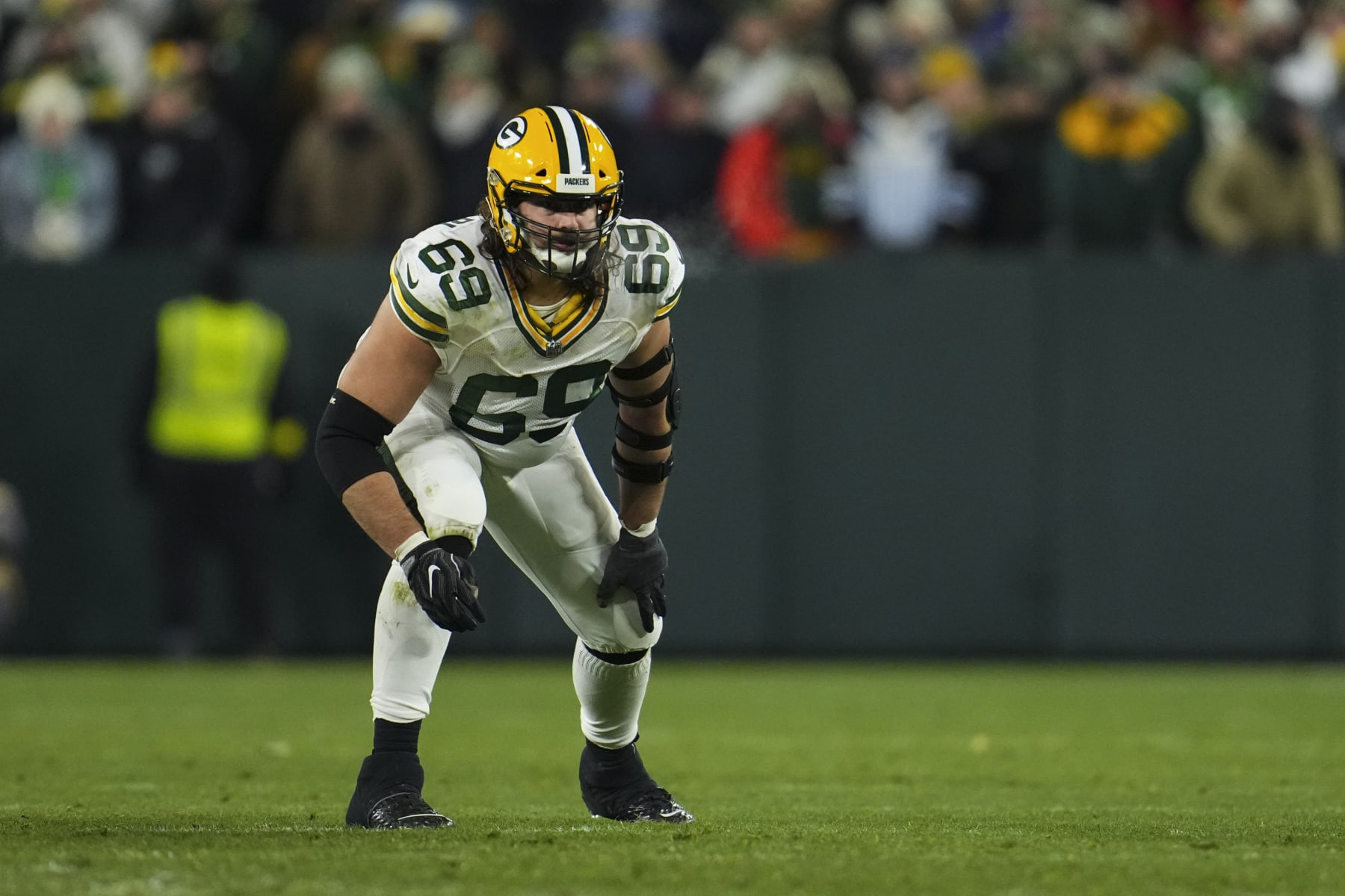 GREEN BAY, WI - NOVEMBER 17: David Bakhtiari #69 of the Green Bay Packers gets set against the Tennessee Titans at Lambeau on November 17, 2022 in Green Bay, Wisconsin. (Photo by Cooper Neill/Getty Images)