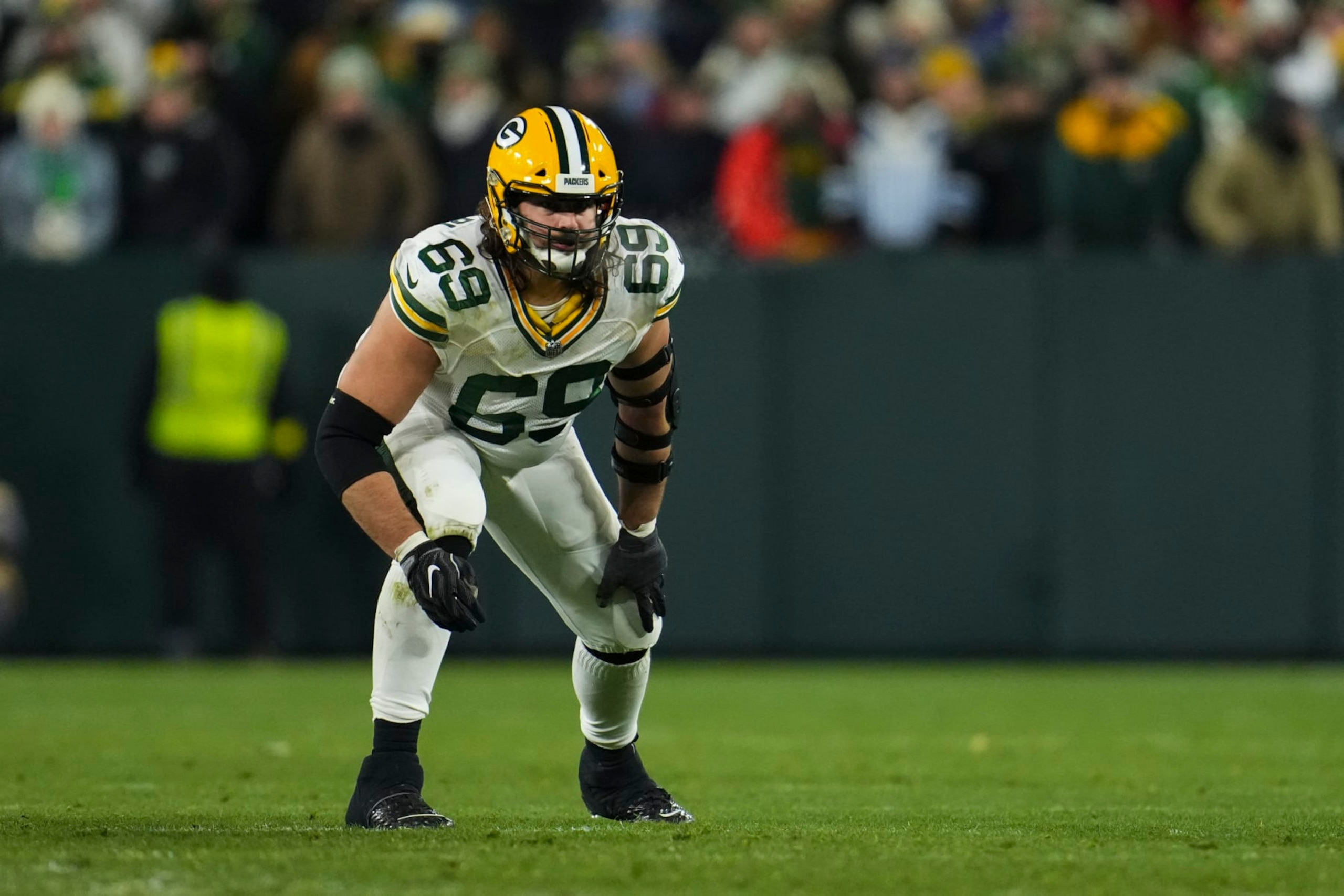 GREEN BAY, WI - NOVEMBER 17: David Bakhtiari #69 of the Green Bay Packers gets set against the Tennessee Titans at Lambeau on November 17, 2022 in Green Bay, Wisconsin. (Photo by Cooper Neill/Getty Images)