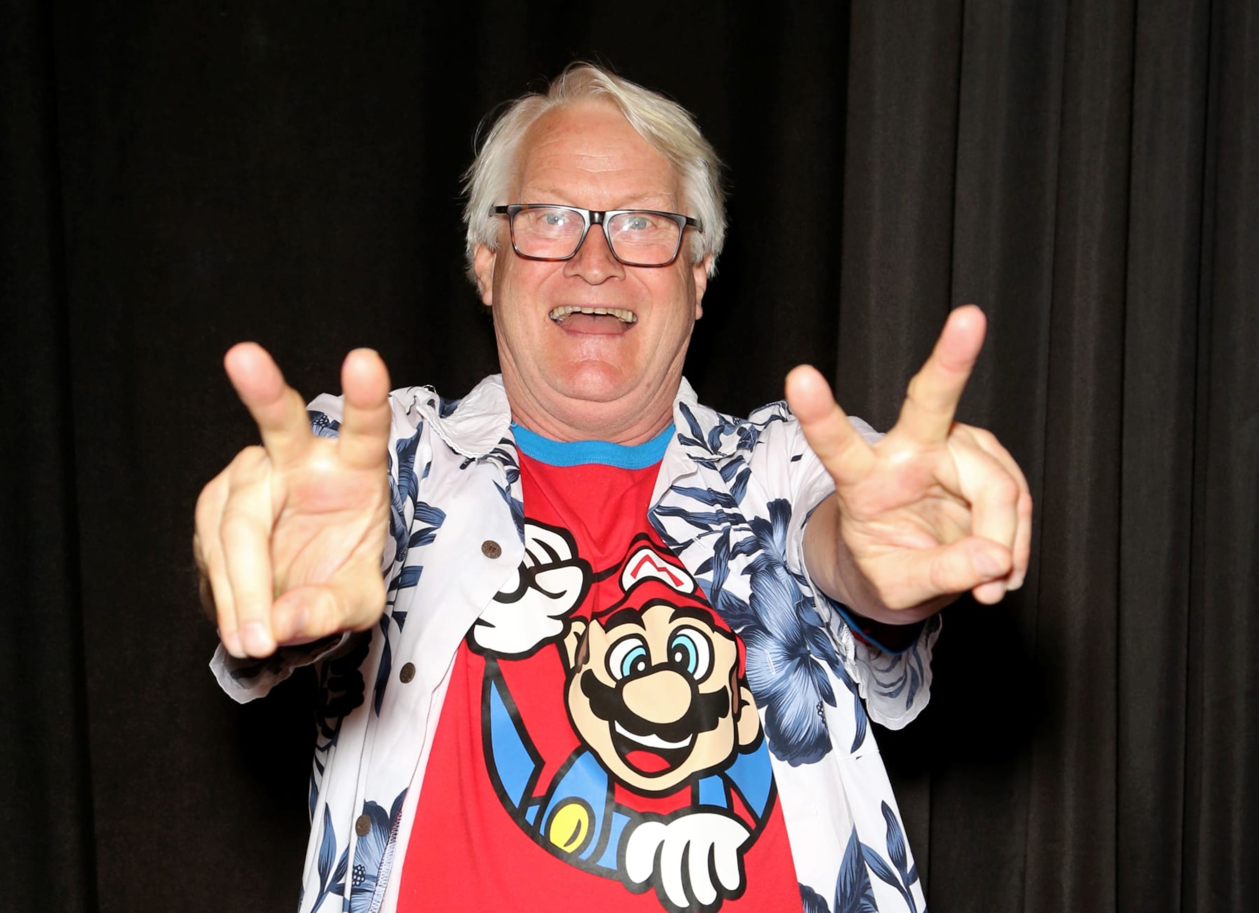 LAS VEGAS, NEVADA - JUNE 15: Voice actor Charles Martinet poses backstage after the "Super Smash Bros Ultimate" challenge during the Seventh Annual Amazing Las Vegas Comic Con at the Las Vegas Convention Center on June 15, 2019 in Las Vegas, Nevada. (Photo by Gabe Ginsberg/Getty Images for Amazing Comic Conventions)