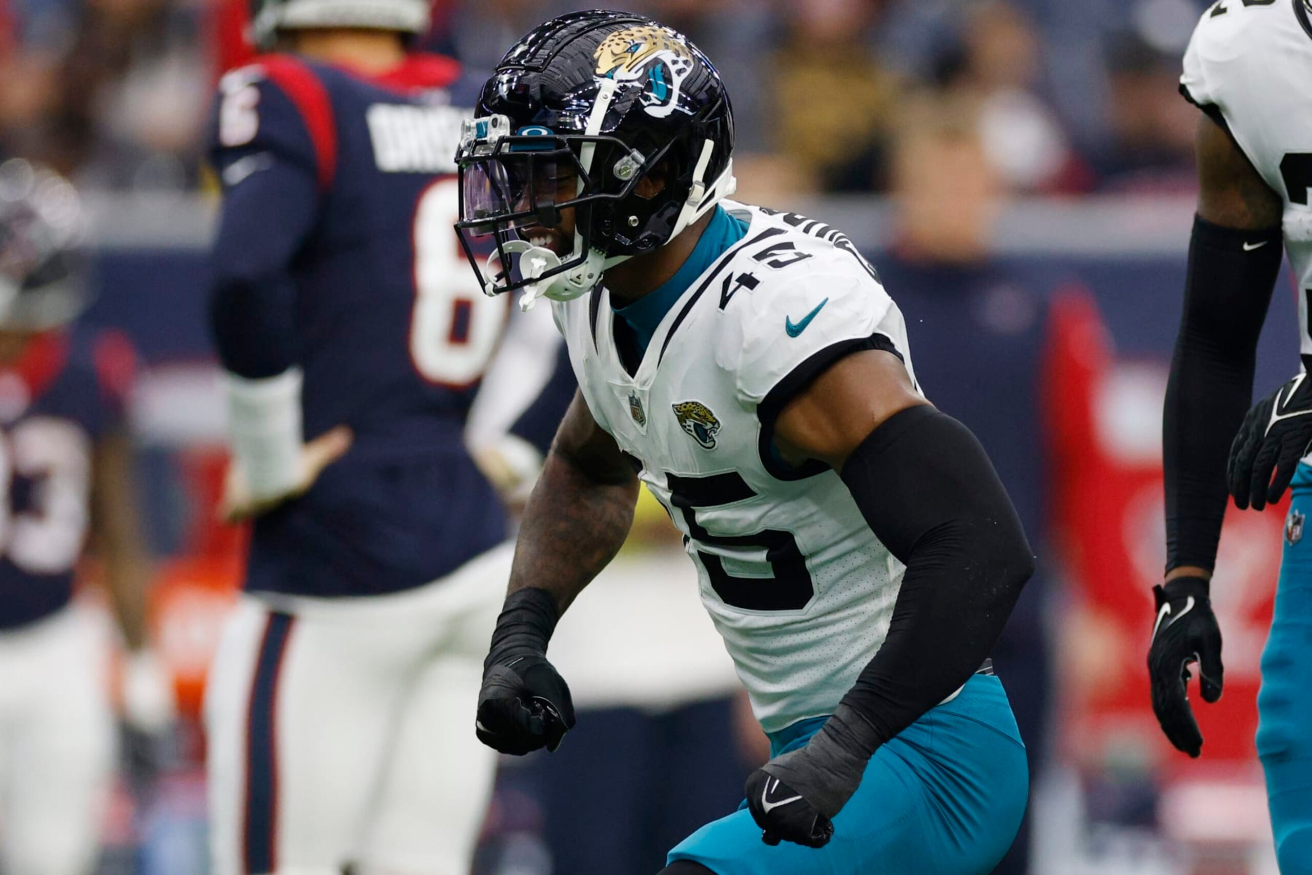 HOUSTON, TEXAS - JANUARY 01: K'Lavon Chaisson #45 of the Jacksonville Jaguars reacts after a play against the Houston Texans during the second quarter at NRG Stadium on January 01, 2023 in Houston, Texas. (Photo by Tim Warner/Getty Images)