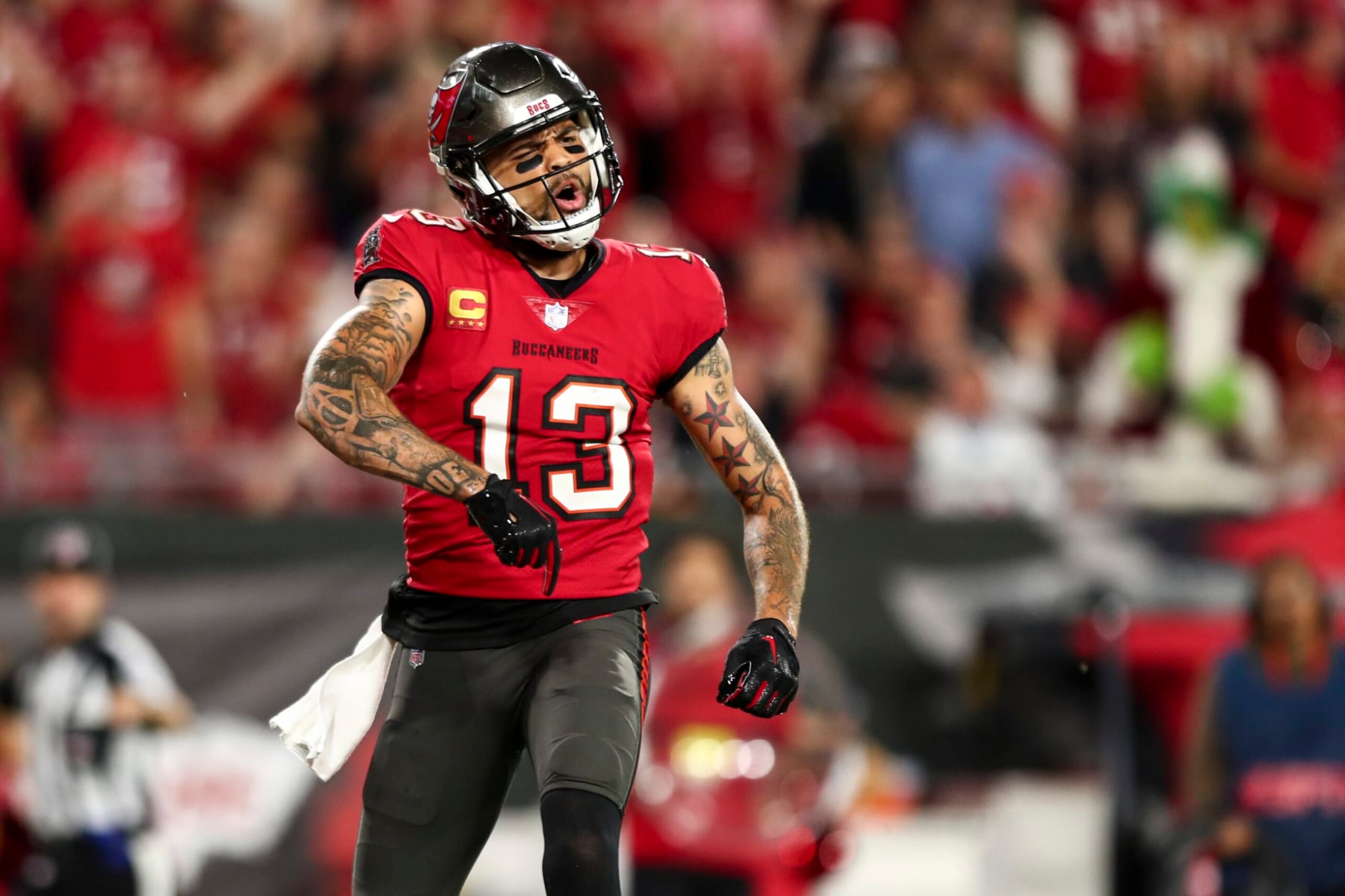 TAMPA, FL - DECEMBER 5: Mike Evans #13 of the Tampa Bay Buccaneers reacts after a pass interference committed by Paulson Adebo #29 of the New Orleans Saints during the fourth quarter of an NFL football game at Raymond James Stadium on December 5, 2022 in Tampa, Florida. (Photo by Kevin Sabitus/Getty Images) TAMPA, FL - DECEMBER 5: Mike Evans #13 of the Tampa Bay Buccaneers reacts after a pass interference committed by Paulson Adebo #29 of the New Orleans Saints during the fourth quarter of an NFL football game at Raymond James Stadium on December 5, 2022 in Tampa, Florida. (Photo by Kevin Sabitus/Getty Images)