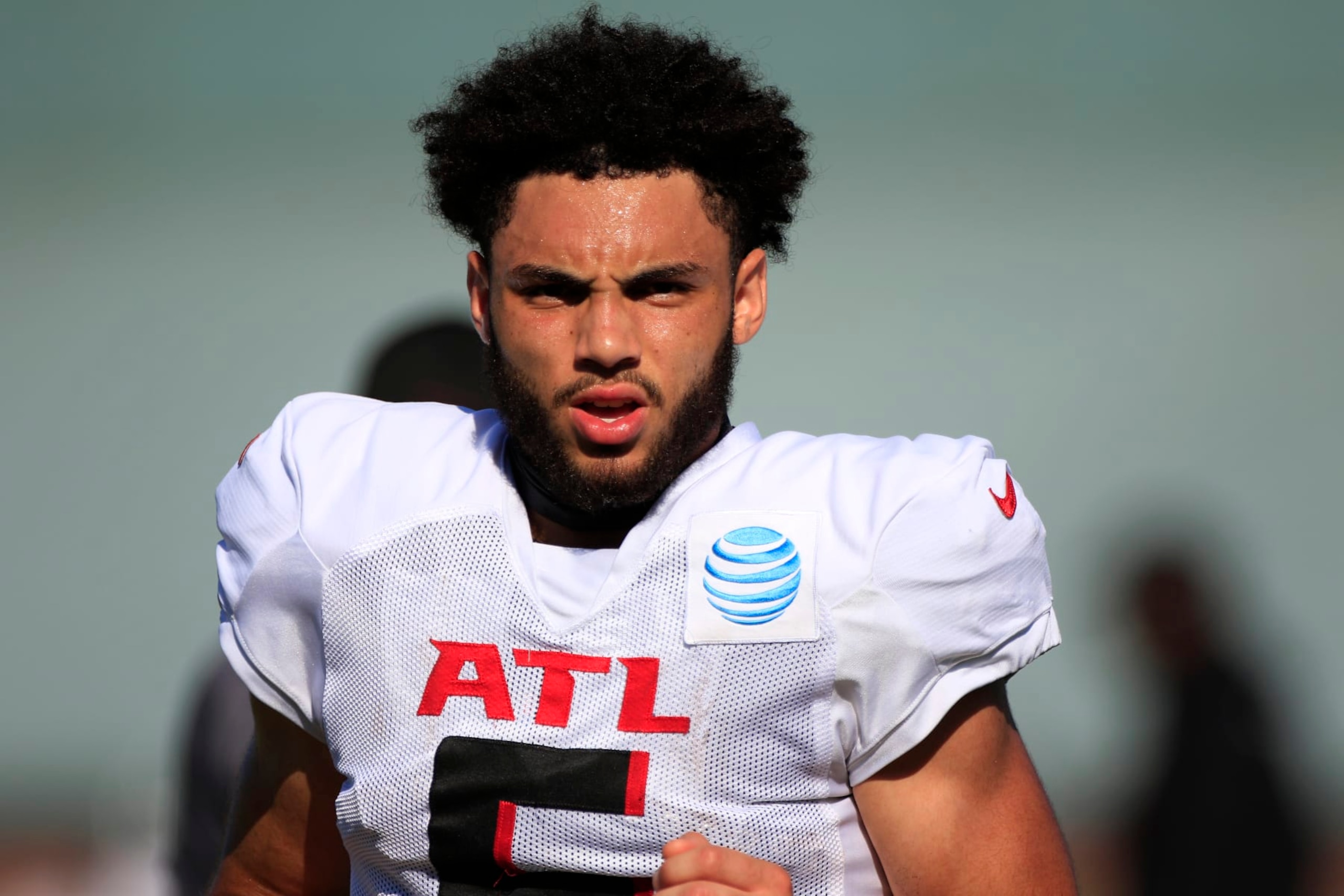 FLOWERY BRANCH, GA - AUGUST 05: Atlanta Falcons wide receiver Drake London #5 stretches during Atlanta Falcons training camp on August 5, 2023 at IBM Performance Field in Flowery Branch, GA.(Photo by Jeff Robinson/Icon Sportswire via Getty Images)