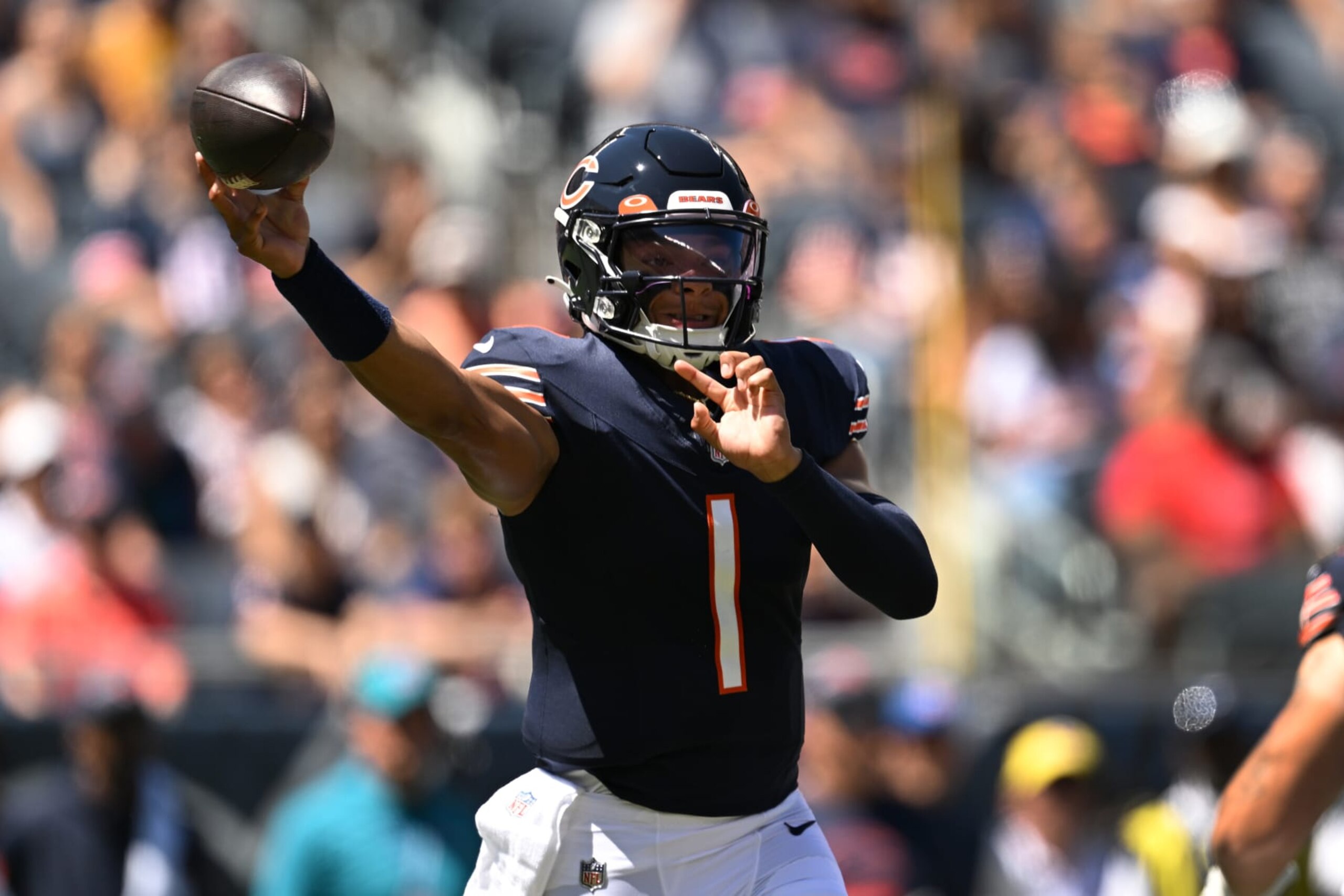 CHICAGO, ILLINOIS - AUGUST 12: Justin Fields #1 of the Chicago Bears passes in the first half against the Tennessee Titans during a preseason game at Soldier Field on August 12, 2023 in Chicago, Illinois. (Photo by Quinn Harris/Getty Images)