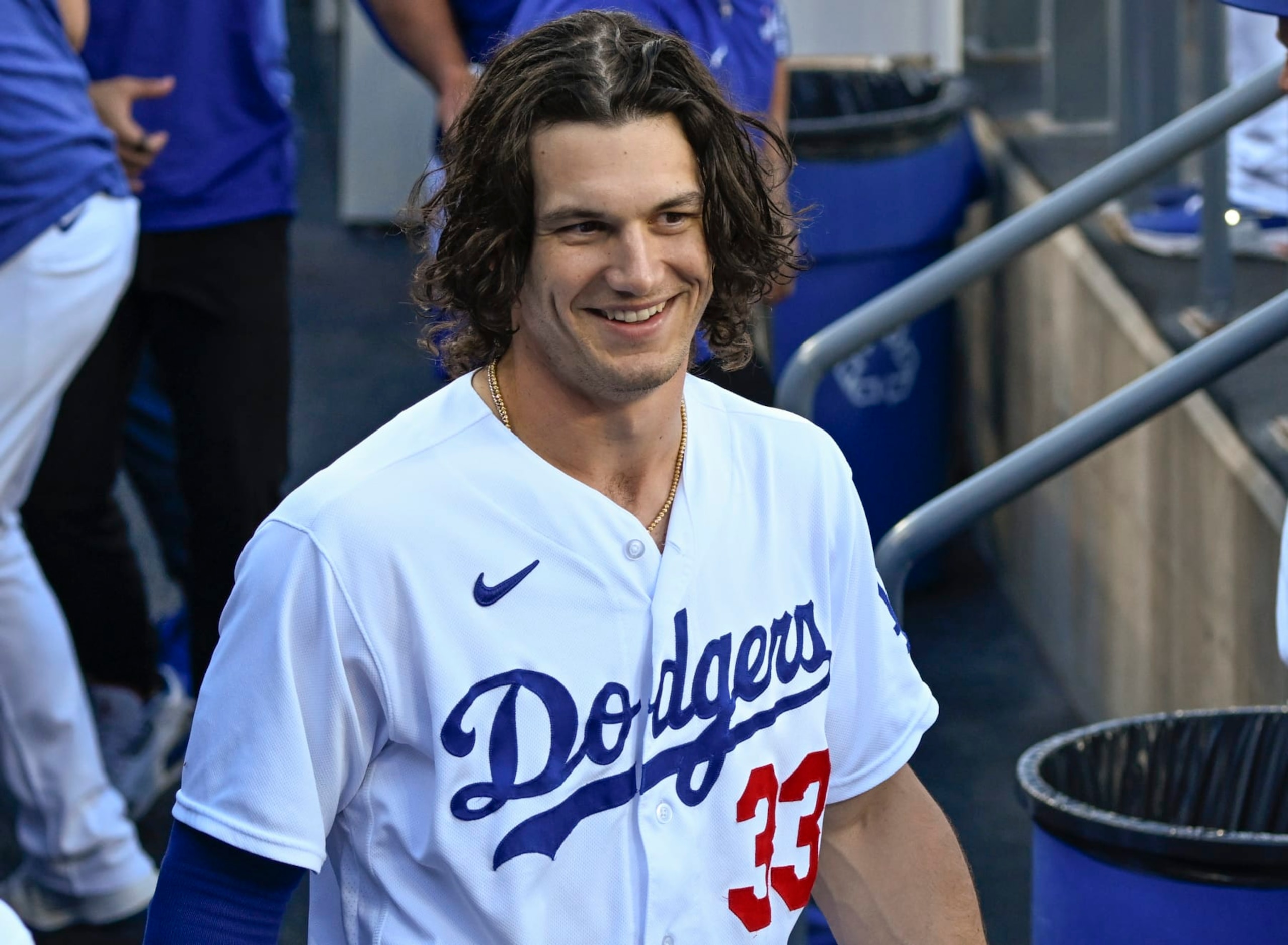 LOS ANGELES, CALIFORNIA - AUGUST 12: James Outman #33 of the Los Angeles Dodgers in the dugout before playing the Colorado Rockies at Dodger Stadium on August 12, 2023 in Los Angeles, California. (Photo by John McCoy/Getty Images)