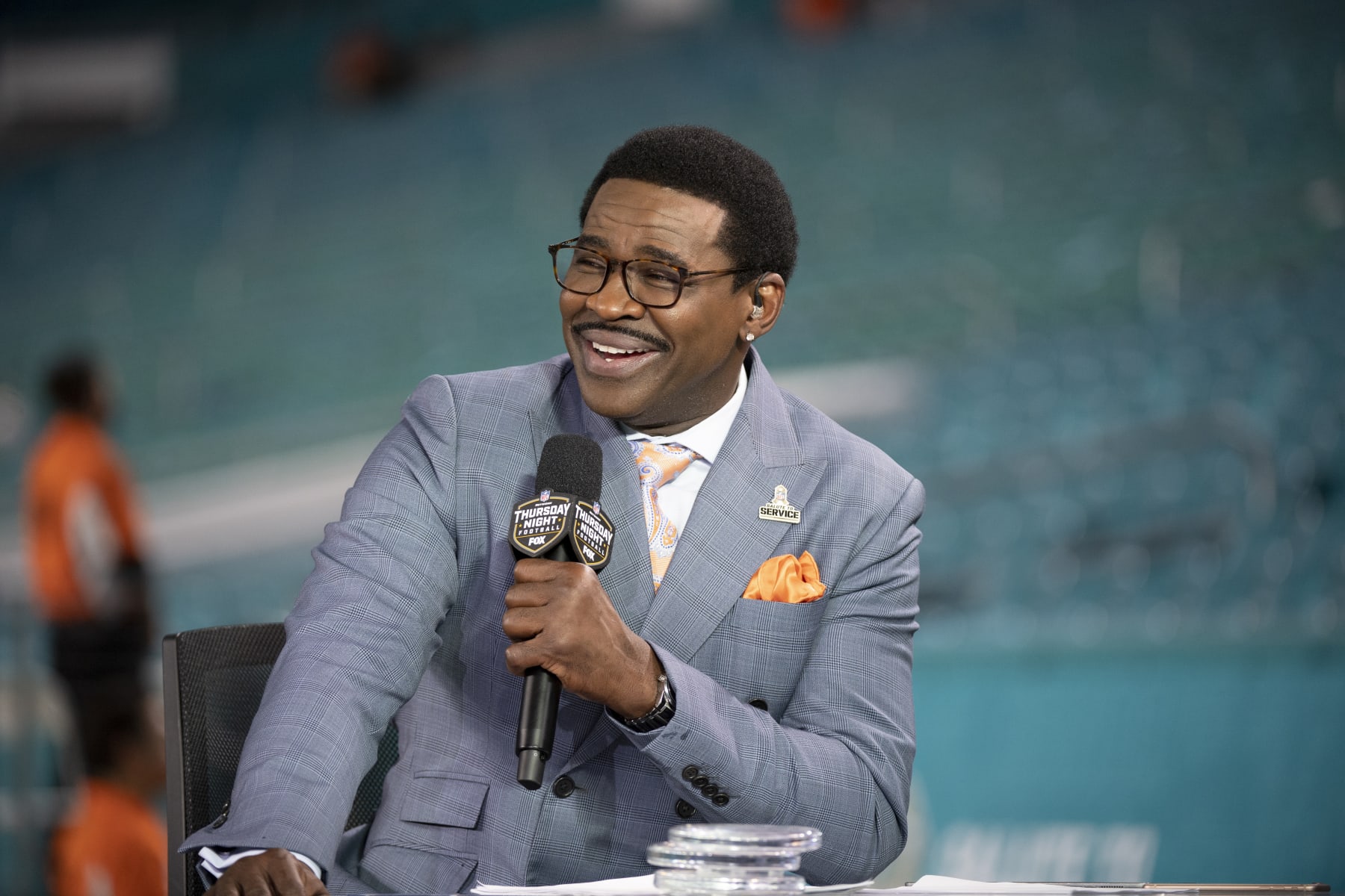 NFL Network analyst Michael Irvin speaks on air during the NFL Network's NFL GameDay Kickoff broadcast before the start of an NFL football game between the Baltimore Ravens and the Miami Dolphins, Thursday Nov. 11, 2021, in Miami Gardens, Fla. (AP Photo/Doug Murray)