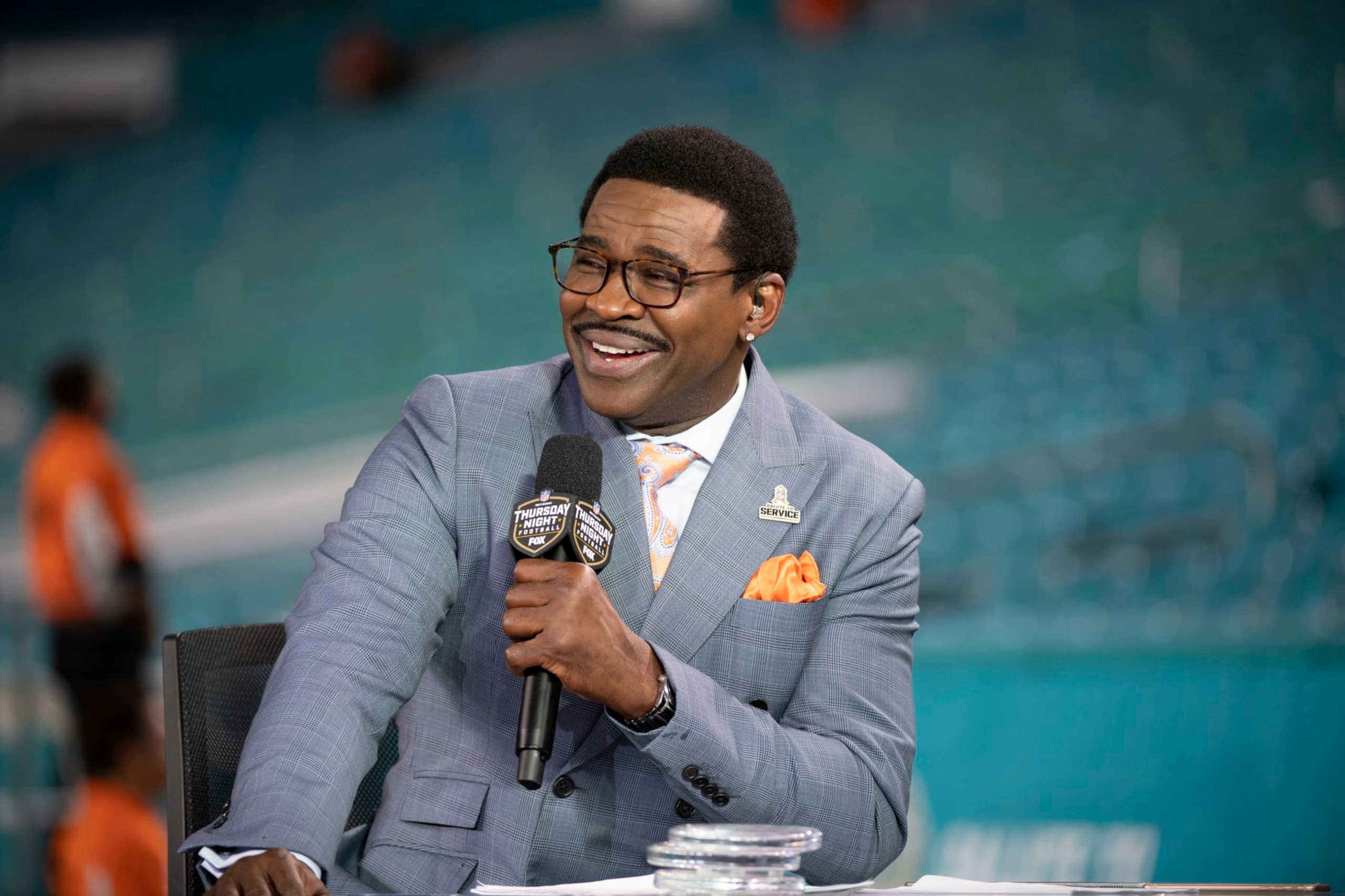 NFL Network analyst Michael Irvin speaks on air during the NFL Network's NFL GameDay Kickoff broadcast before the start of an NFL football game between the Baltimore Ravens and the Miami Dolphins, Thursday Nov. 11, 2021, in Miami Gardens, Fla. (AP Photo/Doug Murray)