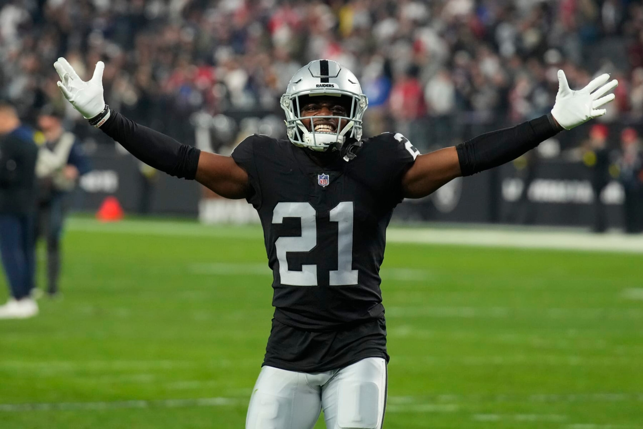 Las Vegas Raiders cornerback Amik Robertson (21) leaves the field after an NFL football game against the New England Patriots, Sunday, Dec. 18, 2022, in Las Vegas. (AP Photo/Rick Scuteri)