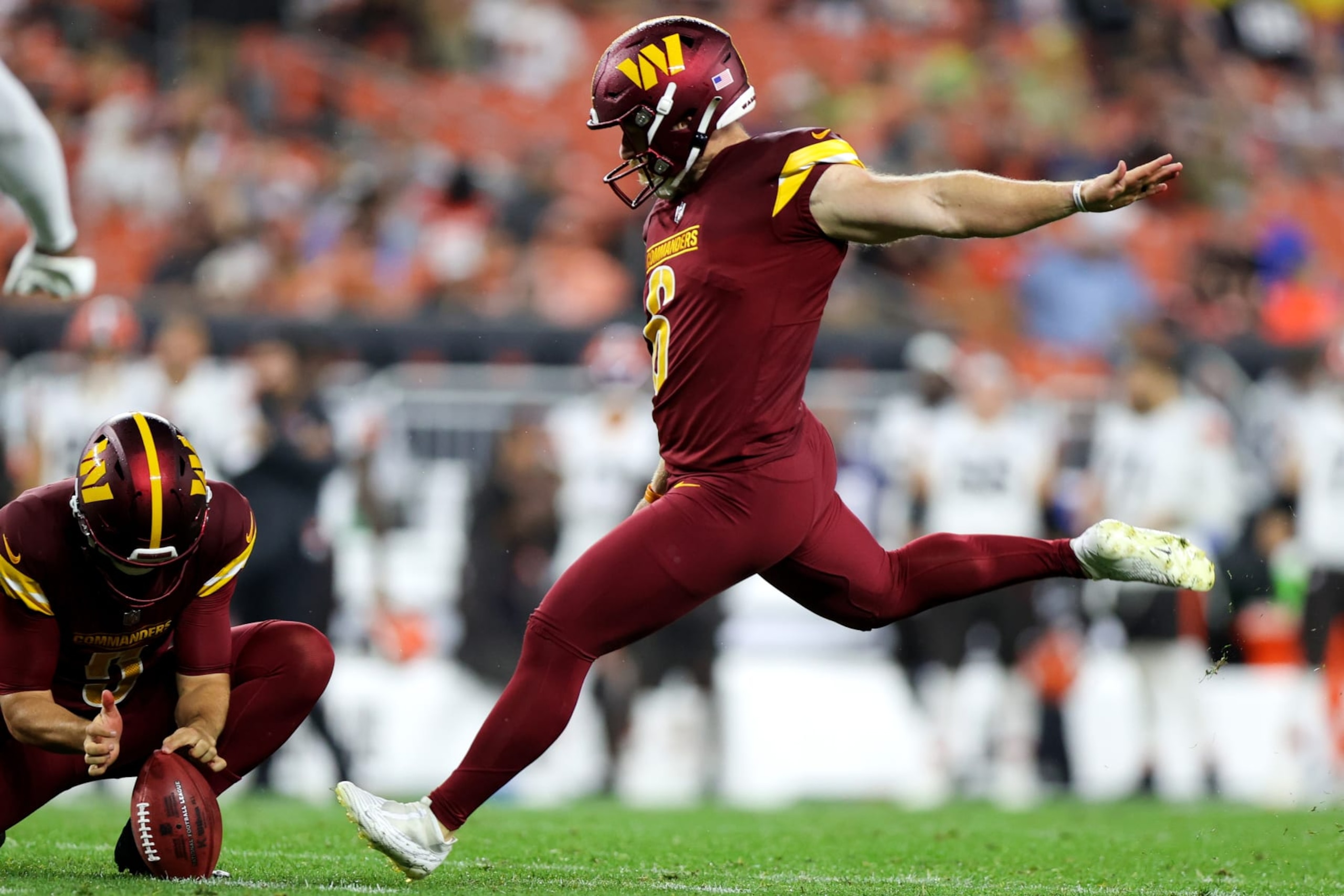 CLEVELAND, OH - AUGUST 11: Washington Commanders place kicker Joey Slye (6) kicks an extra point during the second quarter of the National Football League preseason game between the Washington Commanders and Cleveland Browns on August 11, 2023, at Cleveland Browns Stadium in Cleveland, OH. (Photo by Frank Jansky/Icon Sportswire via Getty Images)