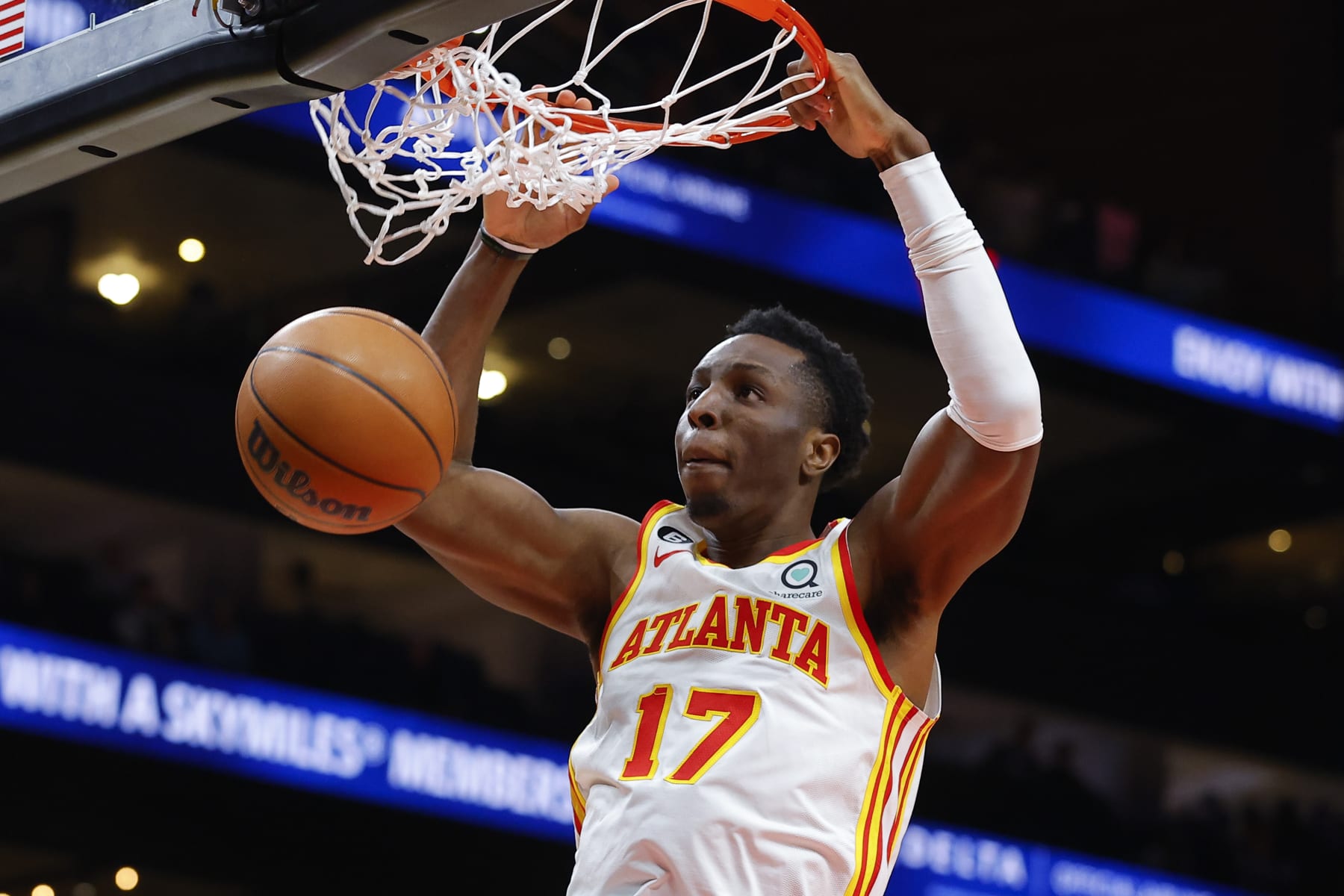 ATLANTA, GA - MARCH 21: Onyeka Okongwu #17 of the Atlanta Hawks dunks during the second half against the Detroit Pistons at State Farm Arena on March 21, 2023 in Atlanta, Georgia. NOTE TO USER: User expressly acknowledges and agrees that, by downloading and or using this photograph, User is consenting to the terms and conditions of the Getty Images License Agreement. (Photo by Todd Kirkland/Getty Images)