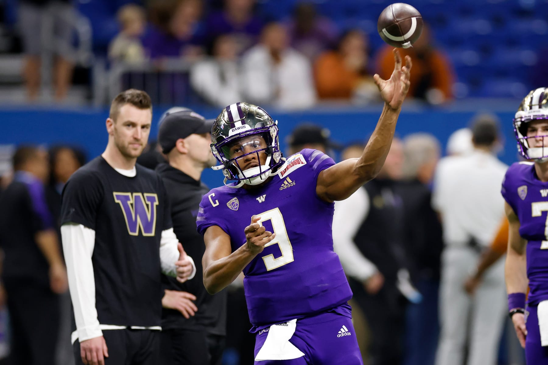 SAN ANTONIO, TEXAS - DECEMBER 29: Michael Penix Jr. #9 of the Washington Huskies warms up before the Valero Alamo Bowl against the Texas Longhorns at the Alamodome on December 29, 2022 in San Antonio, Texas. (Photo by Tim Warner/Getty Images)