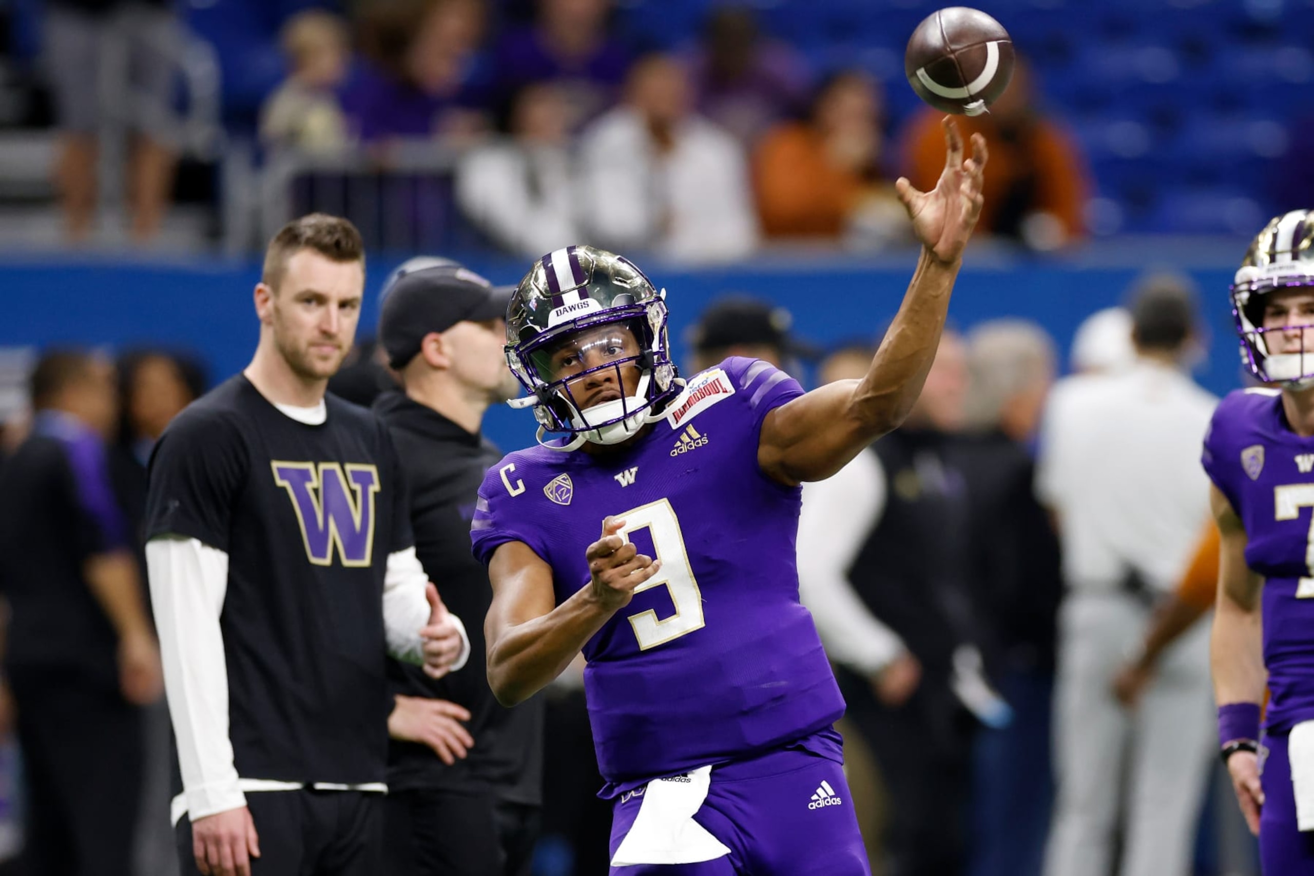 SAN ANTONIO, TEXAS - DECEMBER 29: Michael Penix Jr. #9 of the Washington Huskies warms up before the Valero Alamo Bowl against the Texas Longhorns at the Alamodome on December 29, 2022 in San Antonio, Texas. (Photo by Tim Warner/Getty Images)