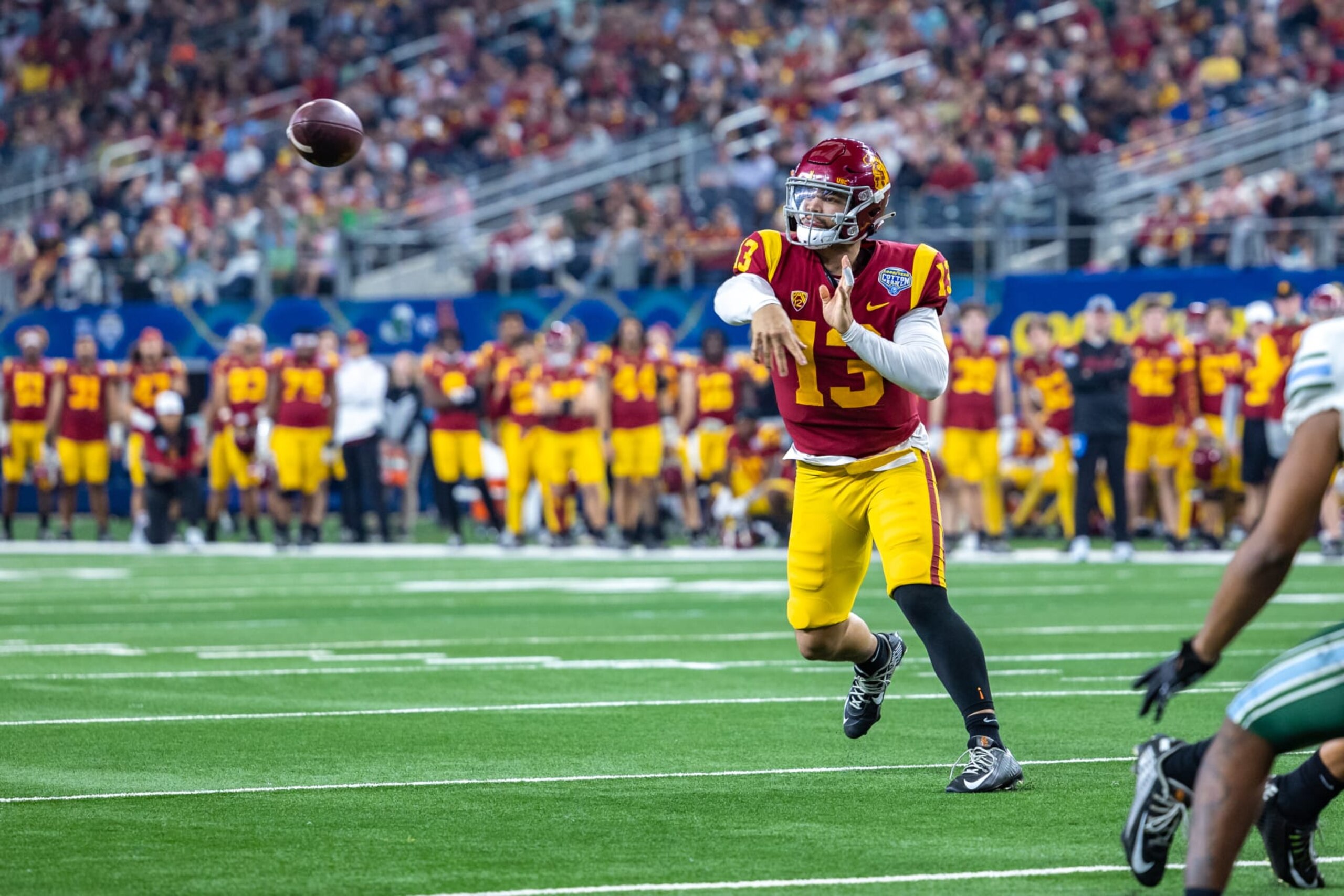 ARLINGTON, TX - JANUARY 02: USC Trojans quarterback Caleb Williams (#13) throws a pass during the Goodyear Cotton Bowl game between the USC Trojans and Tulane Green Wave on January 02, 2023 at AT&T Stadium in Arlington, TX.  (Photo by Matthew Visinsky/Icon Sportswire via Getty Images)