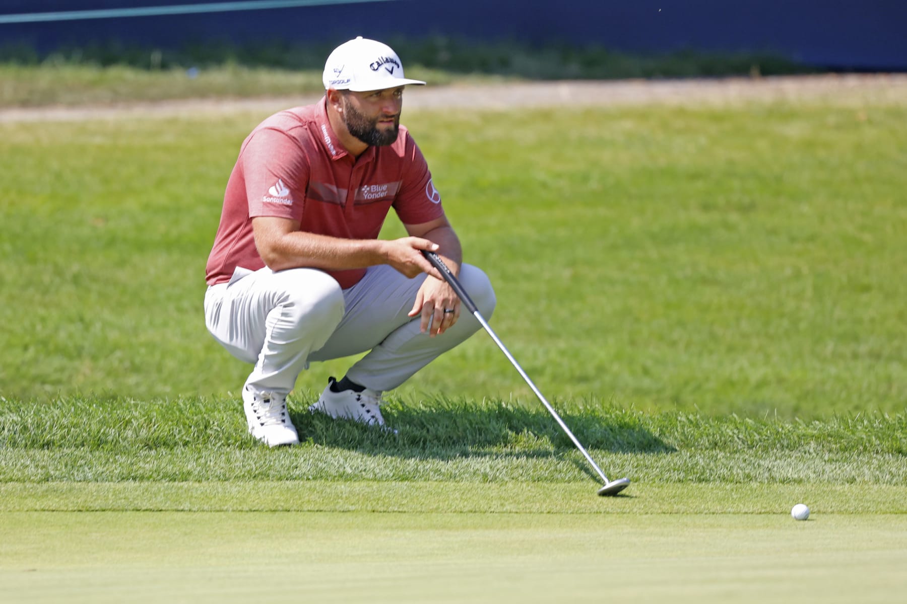 OLYMPIA FIELDS, IL - PGA golfer Jon Rahm lines up a putt on the 13th hole during the final round of the BMW Championship Fed Ex Cup Playoffs on August 20th, 2023, at Olympia Fields Country Club in Olympia Fields, Illinois. (Photo by Brian Spurlock/Icon Sportswire via Getty Images)