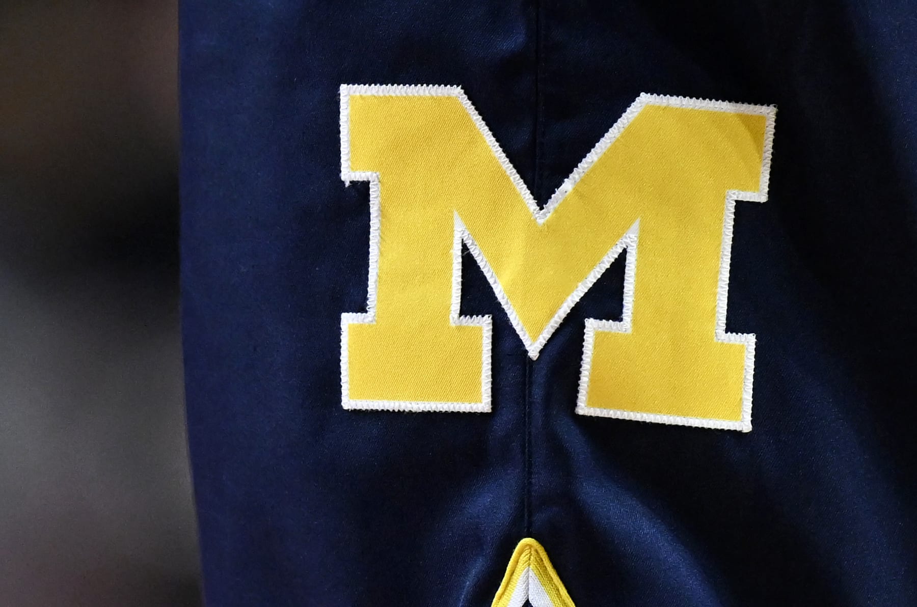 COLLEGE PARK, MARYLAND - JANUARY 19: A view of the Michigan Wolverines logo on their uniform during the game against the Maryland Terrapins at Xfinity Center on January 19, 2023 in College Park, Maryland. (Photo by G Fiume/Getty Images)