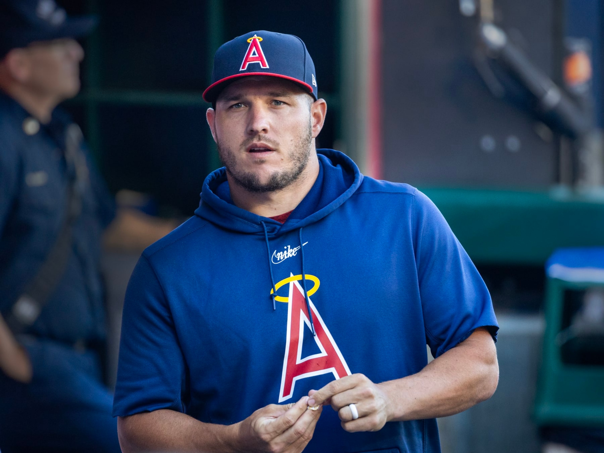 Anaheim, CA - July 21: Angels star Mike Trout walks in the dugout before a game with the Pirates at Angel Stadium in Anaheim Friday, July 21, 2023.  (Allen J. Schaben / Los Angeles Times via Getty Images)