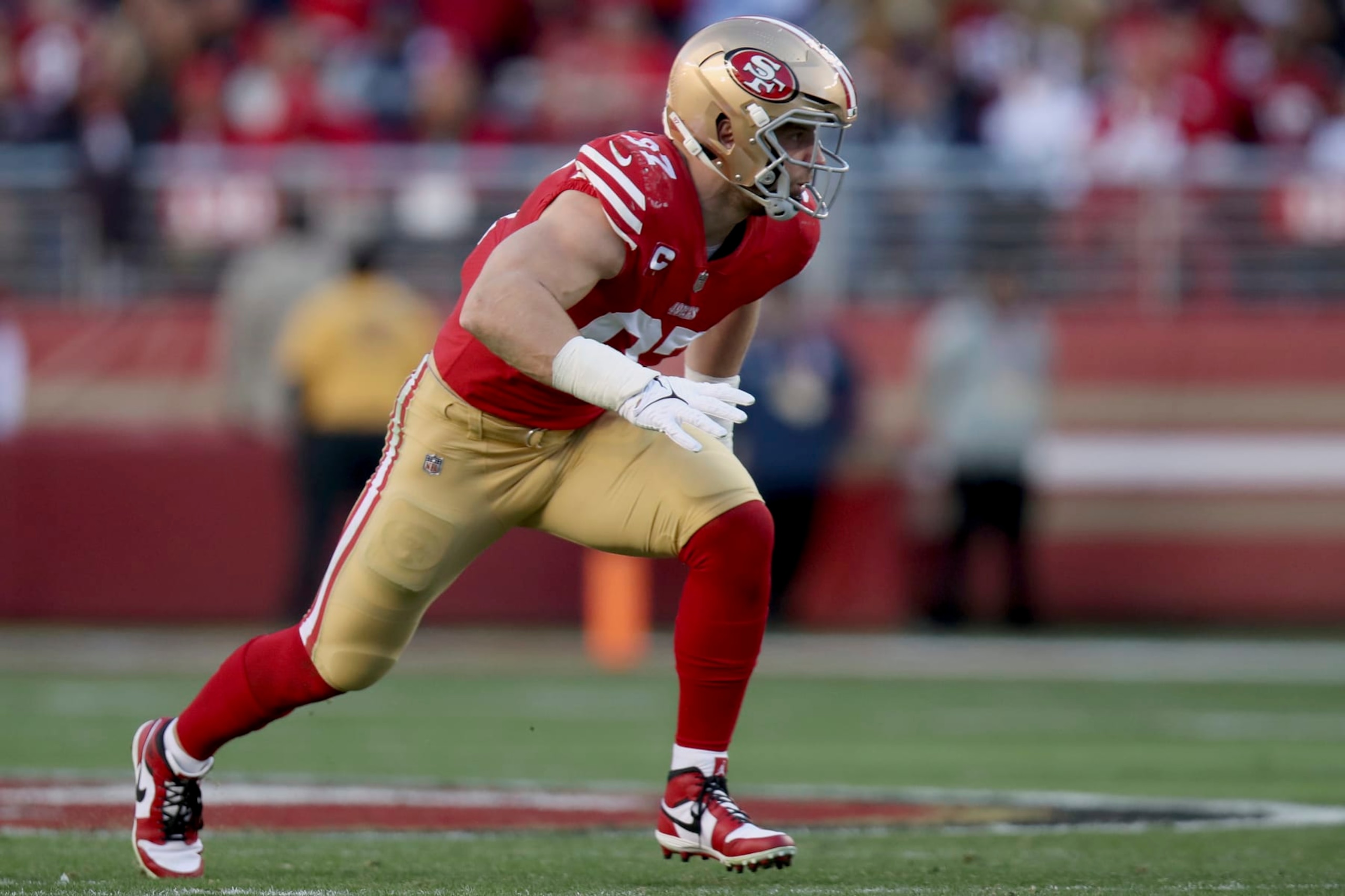 San Francisco 49ers defensive end Nick Bosa (97) rushes during an NFL divisional round playoff football game against the Dallas Cowboys, Sunday, Jan. 22, 2023, in Santa Clara, Calif. (AP Photo/Scot Tucker)