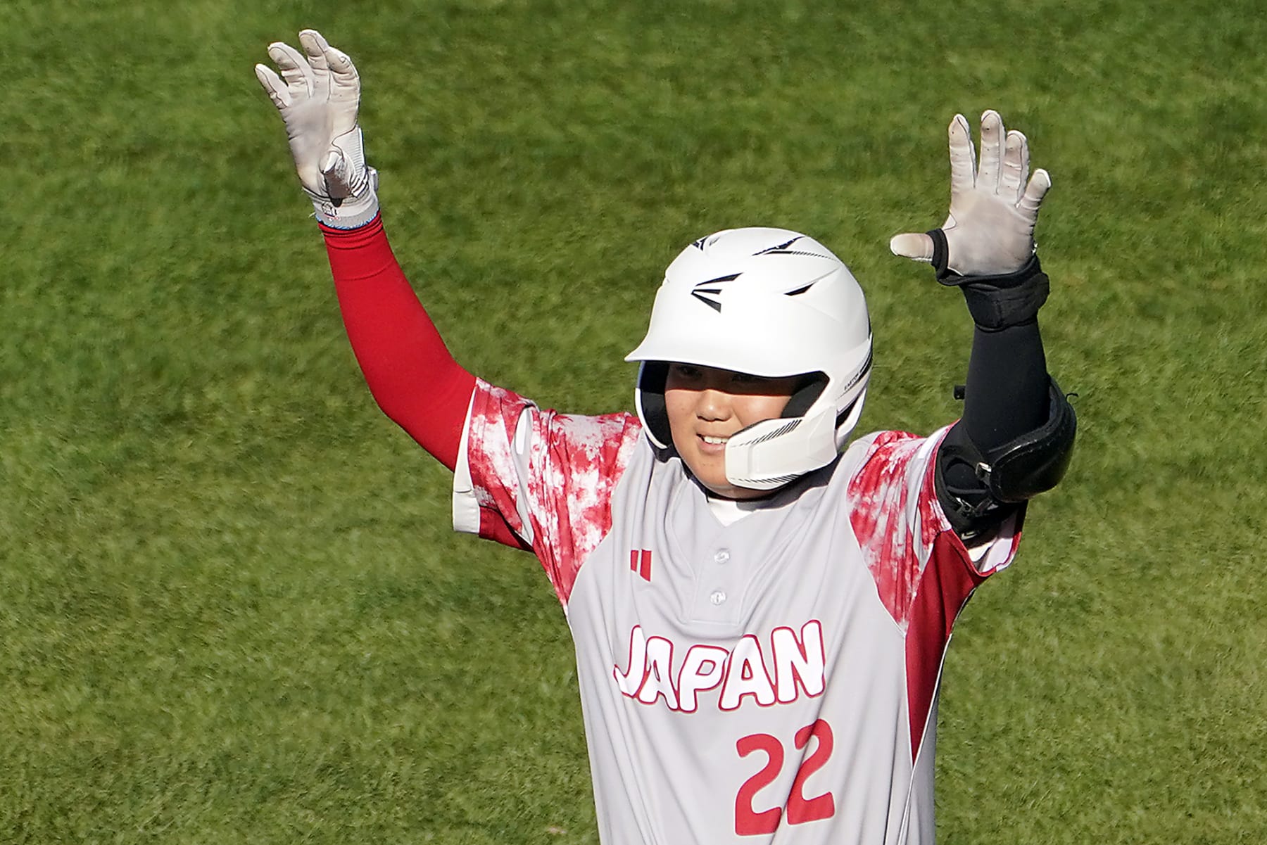 Japan's Nobuaki Sakaue celebrates standing on first base after driving in two runs against Panama during the first inning of a baseball game at the Little League World Series tournament in South Williamsport, Pa., Tuesday, Aug. 22, 2023. (AP Photo/Tom E. Puskar) Japan's Nobuaki Sakaue celebrates standing on first base after driving in two runs against Panama during the first inning of a baseball game at the Little League World Series tournament in South Williamsport, Pa., Tuesday, Aug. 22, 2023. (AP Photo/Tom E. Puskar)