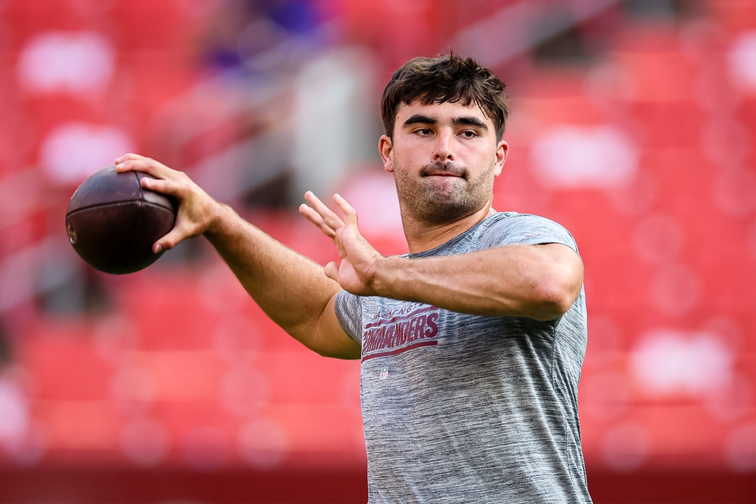 LANDOVER, MD - AUGUST 21: Sam Howell #14 of the Washington Commanders attempts a pass before the preseason game against the Baltimore Ravens at FedExField on August 21, 2023 in Landover, Maryland. (Photo by Scott Taetsch/Getty Images)
