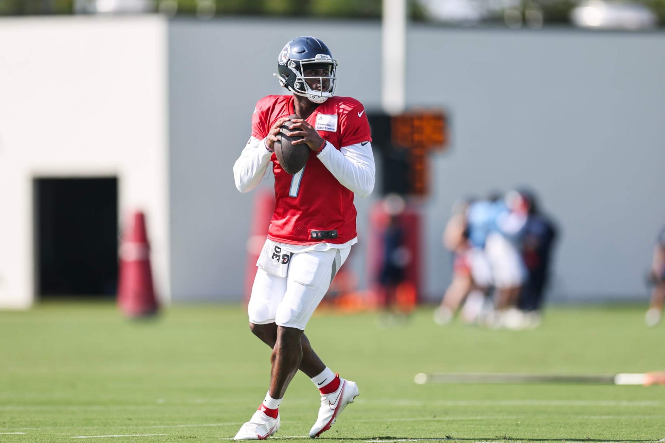NASHVILLE, TENNESSEE - AUGUST 22: Malik Willis #7 of the Tennessee Titans throws a pass during quarterback drills in the training camp at Ascension Saint Thomas Sports Park on August 22, 2023 in Nashville, Tennessee. (Photo by Silas Walker/Getty Images)