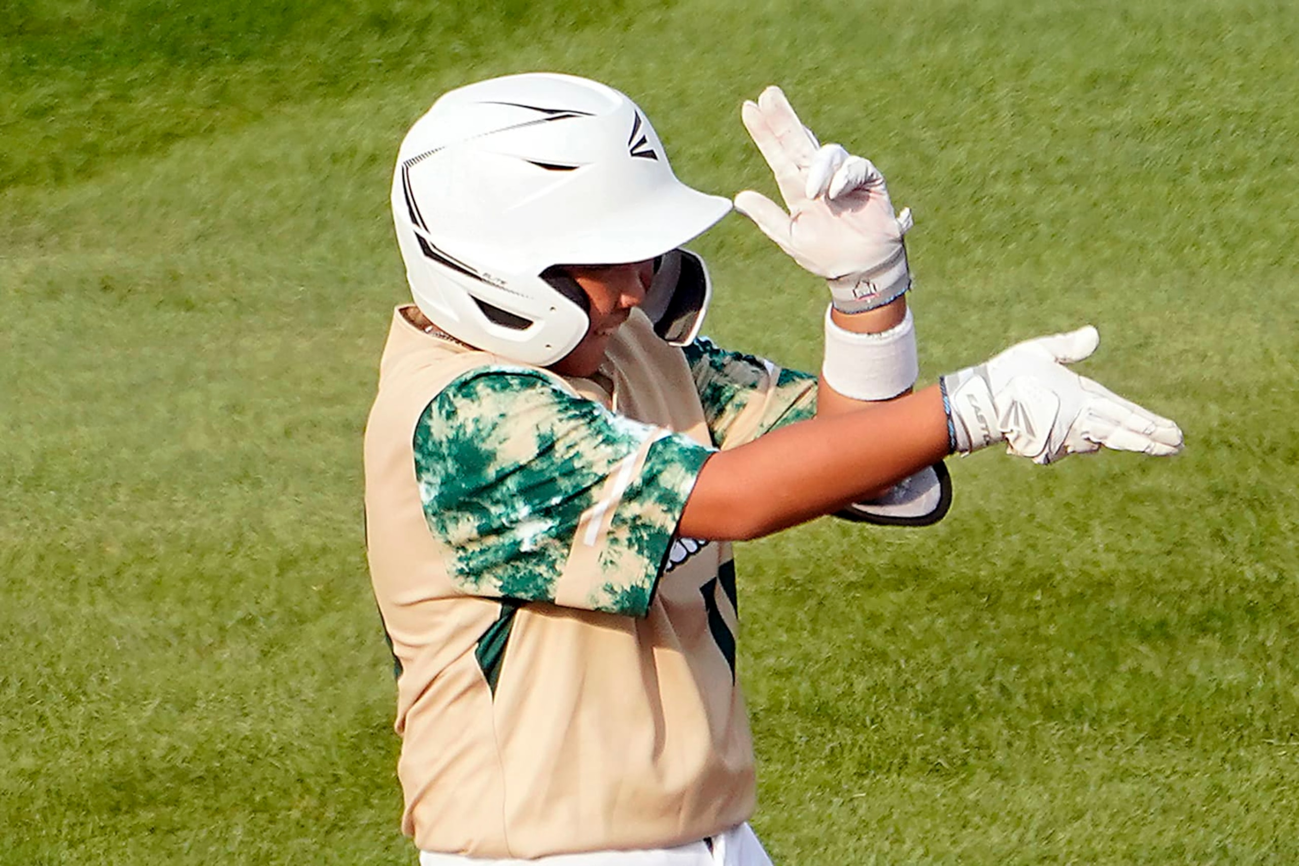 Taiwan's Hsu Shao-Chieh celebrates while standing on second base after driving in two runs off Japan's Akito Masuda during the first inning of a baseball game at the Little League World Series tournament in South Williamsport, Pa., Monday, Aug. 21, 2023. (AP Photo/Tom E. Puskar)