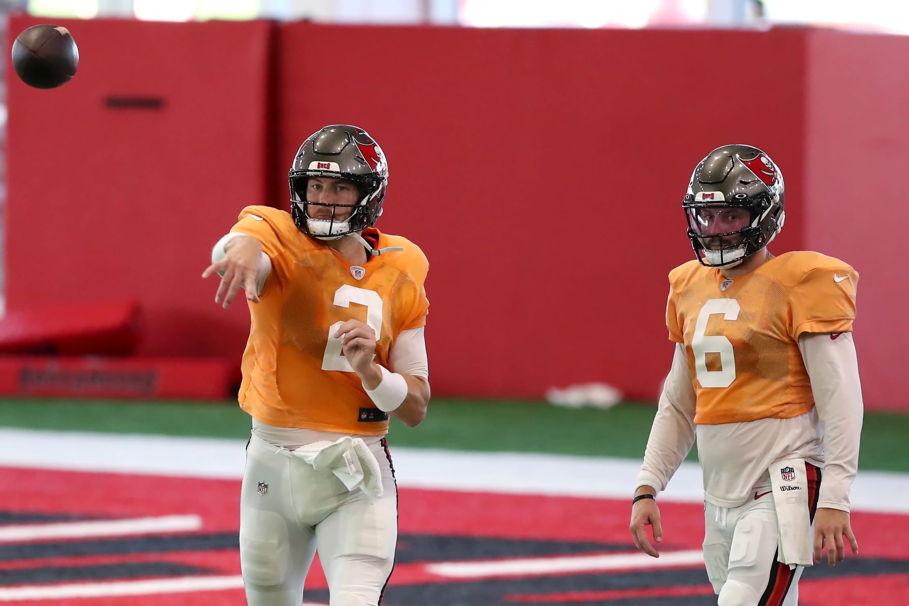 TAMPA, FL - AUGUST 1: Tampa Bay Buccaneers Quarterback Kyle Trask (2) goes thru a drill as Quarterback Baker Mayfield (6) looks on during the Tampa Bay Buccaneers Training Camp on August 1, 2023 at the AdventHealth Training Center at One Buccaneer Place in Tampa, Florida. (Photo by Cliff Welch/Icon Sportswire via Getty Images)