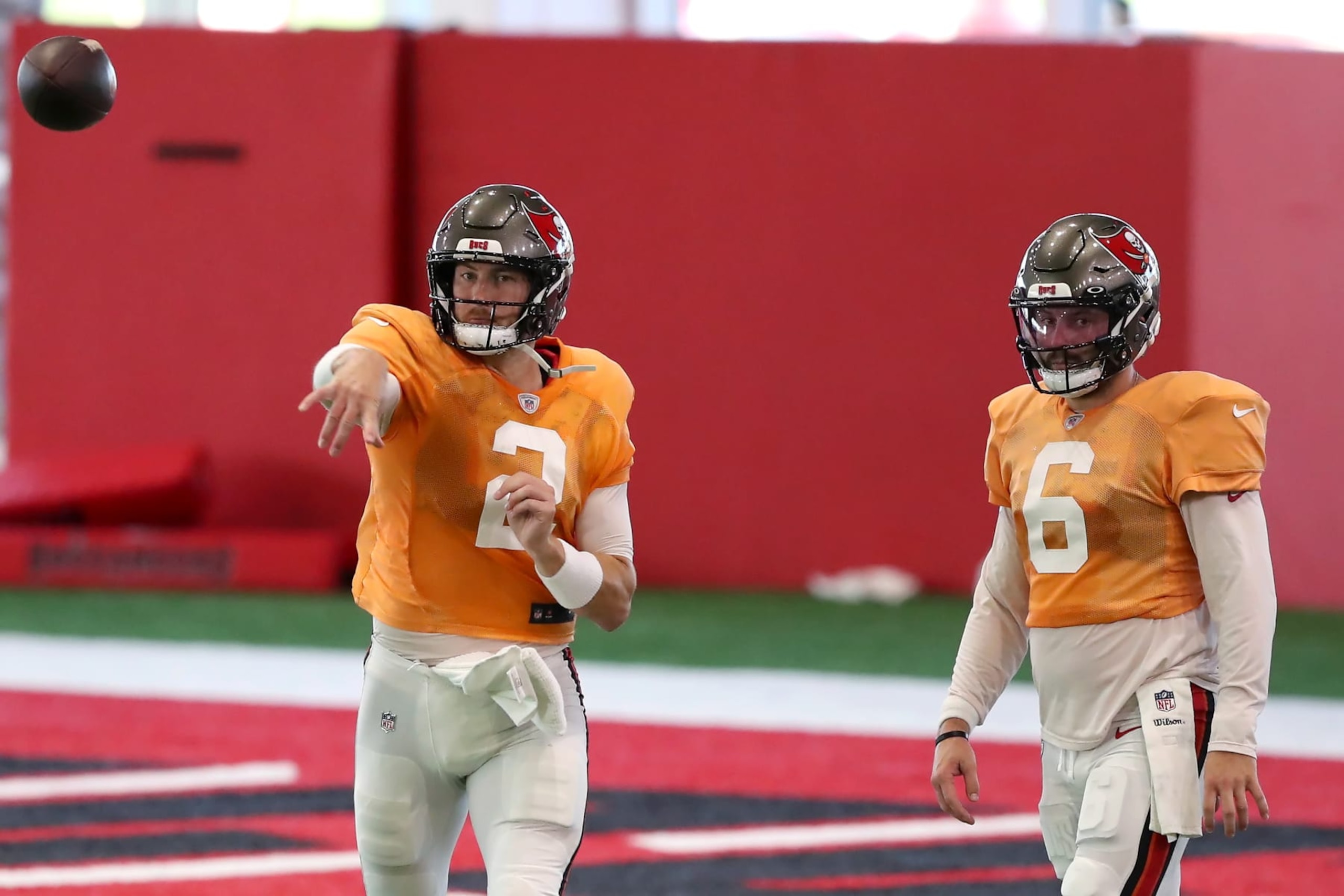 TAMPA, FL - AUGUST 1: Tampa Bay Buccaneers Quarterback Kyle Trask (2) goes thru a drill as Quarterback Baker Mayfield (6) looks on during the Tampa Bay Buccaneers Training Camp on August 1, 2023 at the AdventHealth Training Center at One Buccaneer Place in Tampa, Florida. (Photo by Cliff Welch/Icon Sportswire via Getty Images)