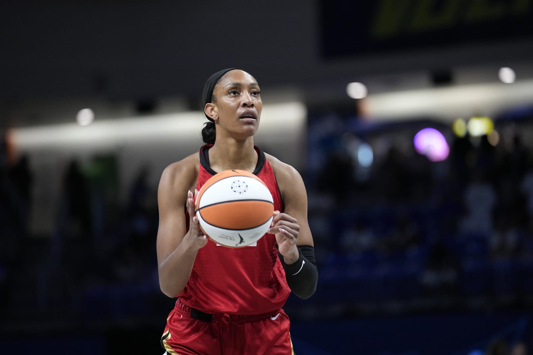 Las Vegas Aces' A'ja Wilson shoots free throws during a WNBA basketball game against the Dallas Wings, Tuesday, Aug. 8, 2023, in Arlington, Texas. (AP Photo/Tony Gutierrez)