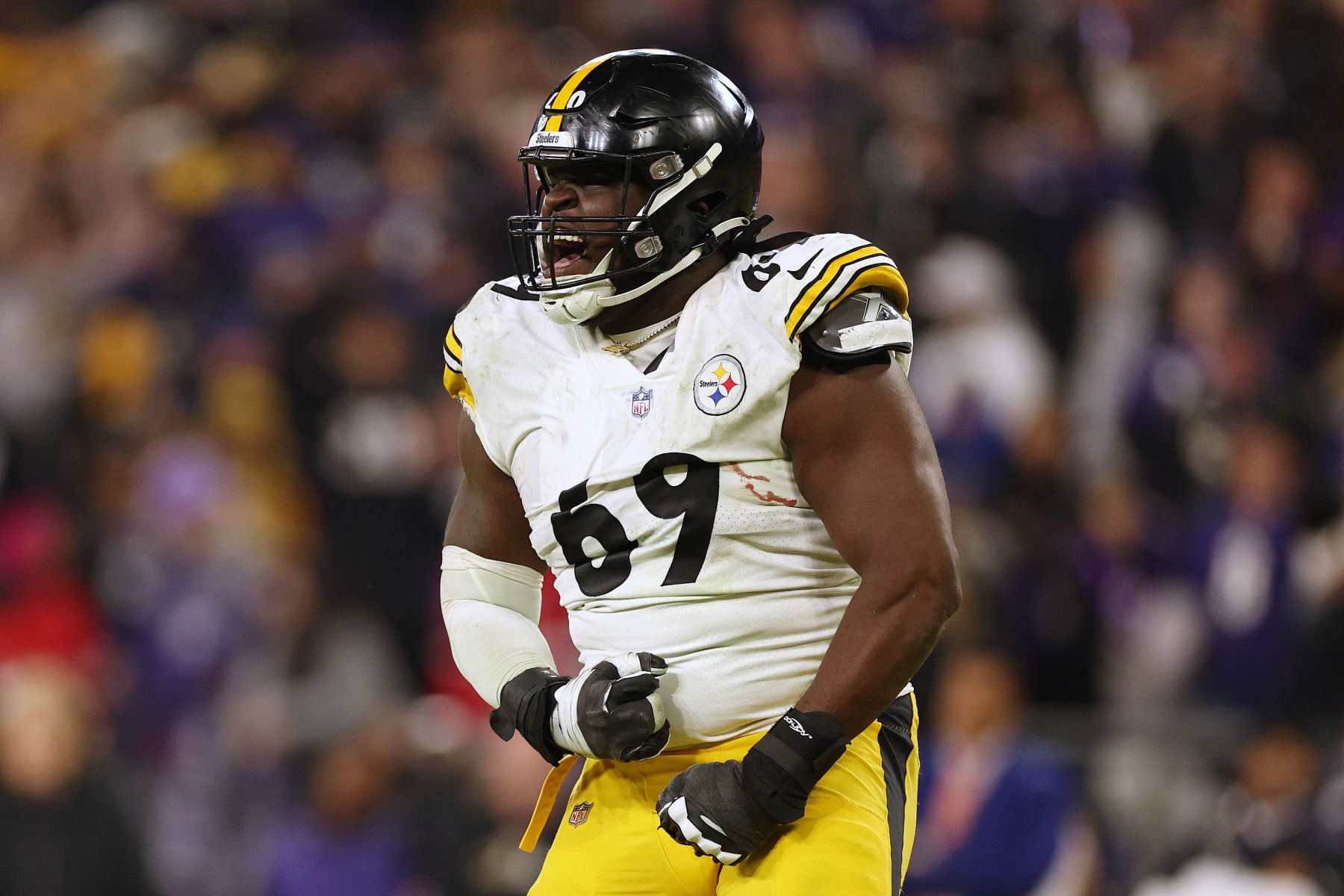 BALTIMORE, MARYLAND - JANUARY 01: Kevin Dotson #69 of the Pittsburgh Steelers celebrates a touchdown by Najee Harris #22 during the fourth quarter at M&T Bank Stadium on January 01, 2023 in Baltimore, Maryland. (Photo by Rob Carr/Getty Images)