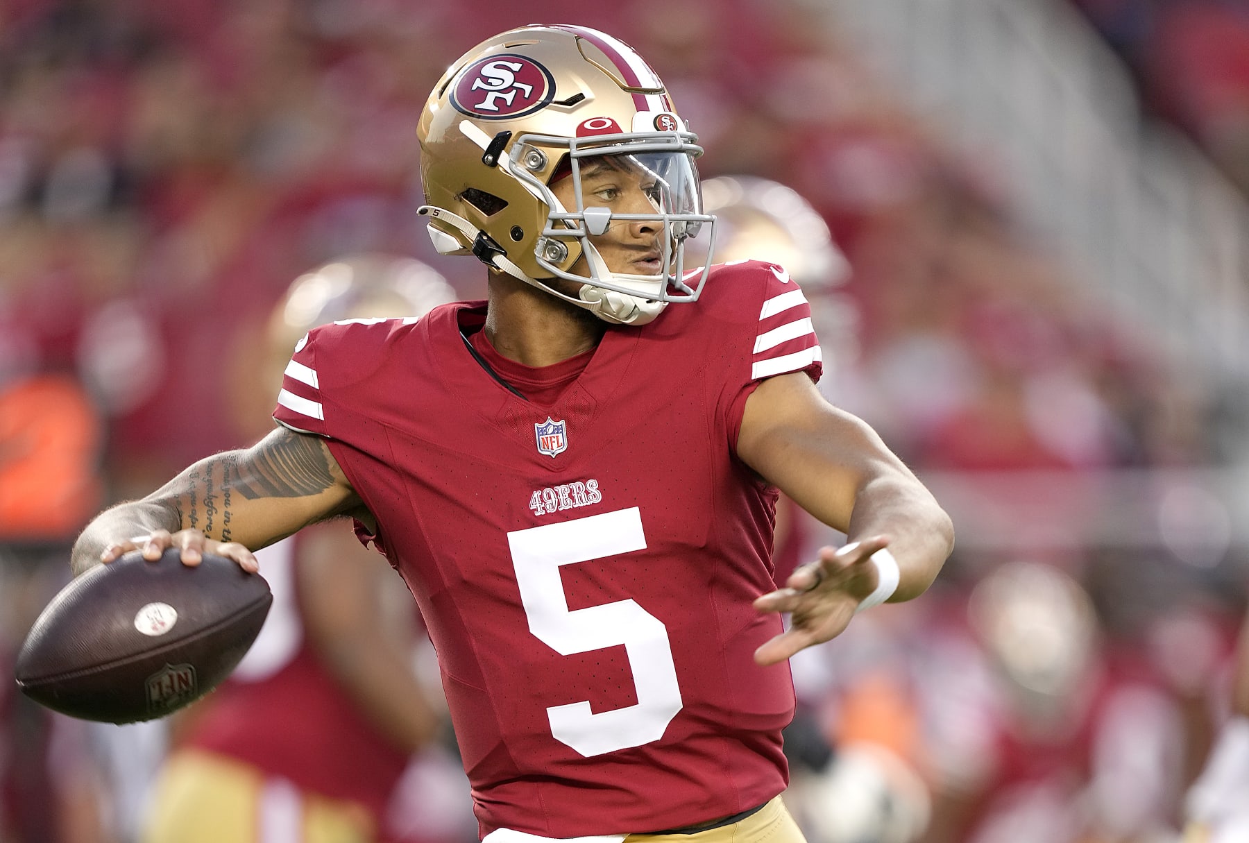 SANTA CLARA, CALIFORNIA - AUGUST 19: Trey Lance #5 of the San Francisco 49ers looks to pass the ball against the Denver Broncos in the fourth quarter at Levi's Stadium on August 19, 2023 in Santa Clara, California. (Photo by Thearon W. Henderson/Getty Images)