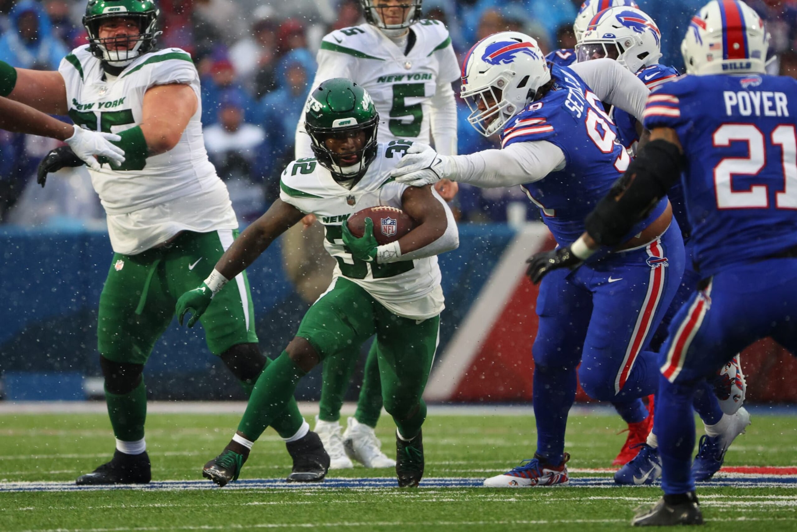ORCHARD PARK, NY - DECEMBER 11: Michael Carter #32 of the New York Jets runs the ball against the Buffalo Bills at Highmark Stadium on December 11, 2022 in Orchard Park, New York. (Photo by Timothy T Ludwig/Getty Images)