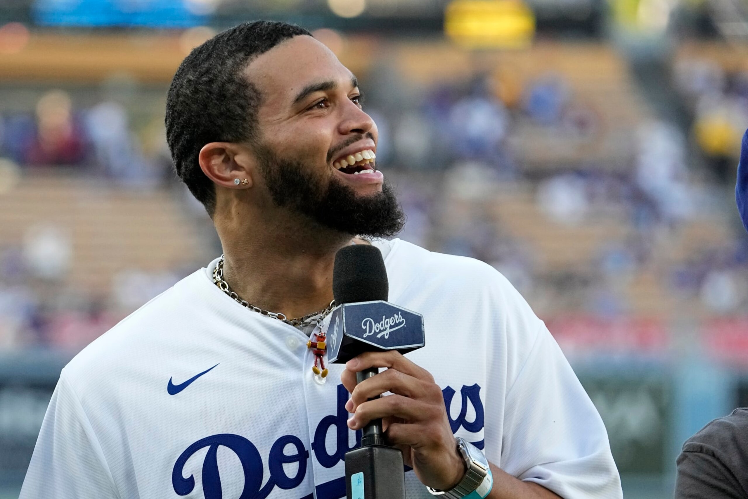 Southern California quarterback Caleb Williams reacts to fans prior to a baseball game between the Los Angeles Dodgers and the Los Angeles Angels Friday, July 7, 2023, in Los Angeles. (AP Photo/Mark J. Terrill)