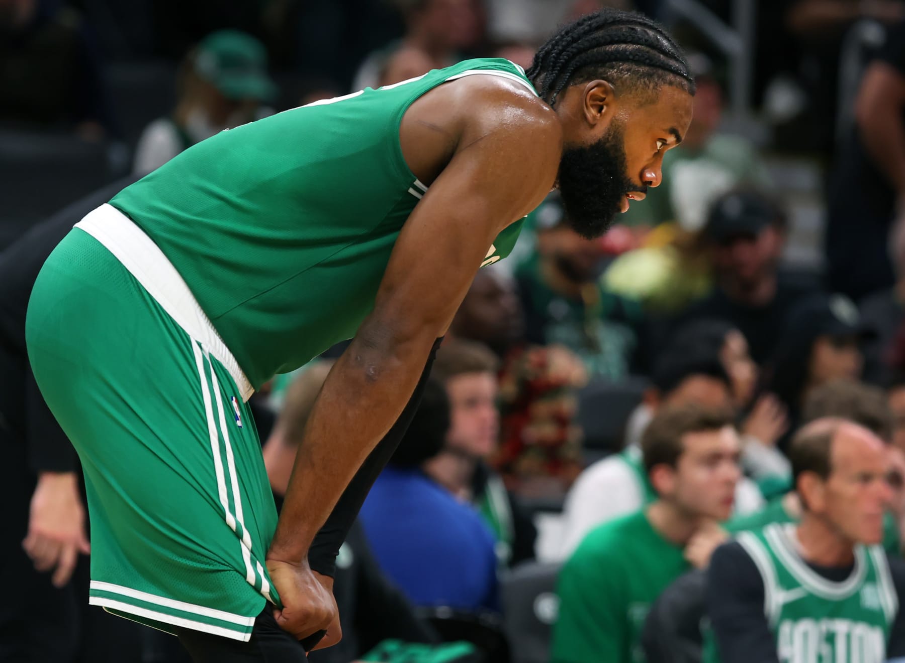 Boston, MA - May 29: Boston Celtics SG Jaylen Brown puts his hands on his knees late in the game. The Celtics lost to the Miami Heat, 103-84, in Game 7 of the 2023 Eastern Conference Finals. (Photo by Jim Davis/The Boston Globe via Getty Images)