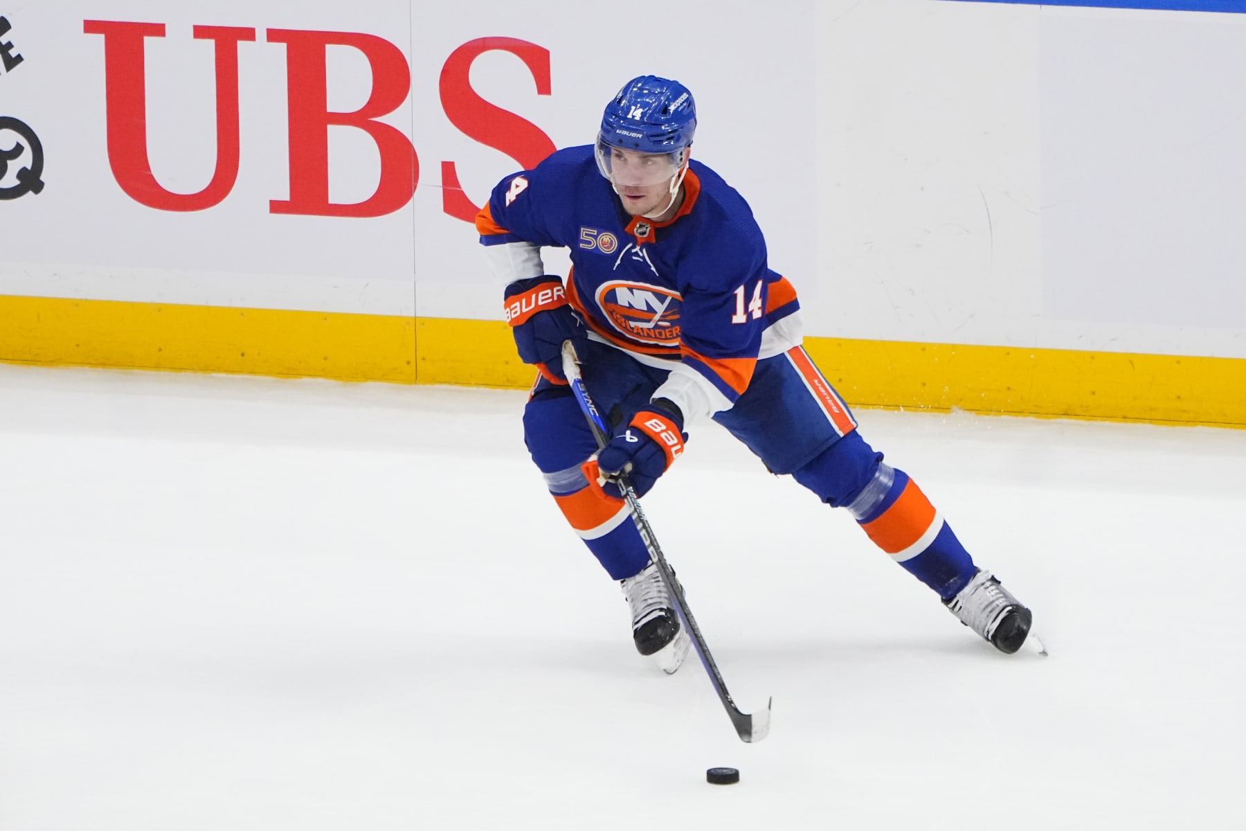 ELMONT, NY - APRIL 21: New York Islanders Center Bo Horvat (14) controls the puck during the first period  of Game 3 of the National Hockey League Eastern Conference First Round Playoff game between the Carolina Hurricanes and New York Islanders on April 21, 2023, at UBS Arena in Elmont, NY.  (Photo by Gregory Fisher/Icon Sportswire via Getty Images)