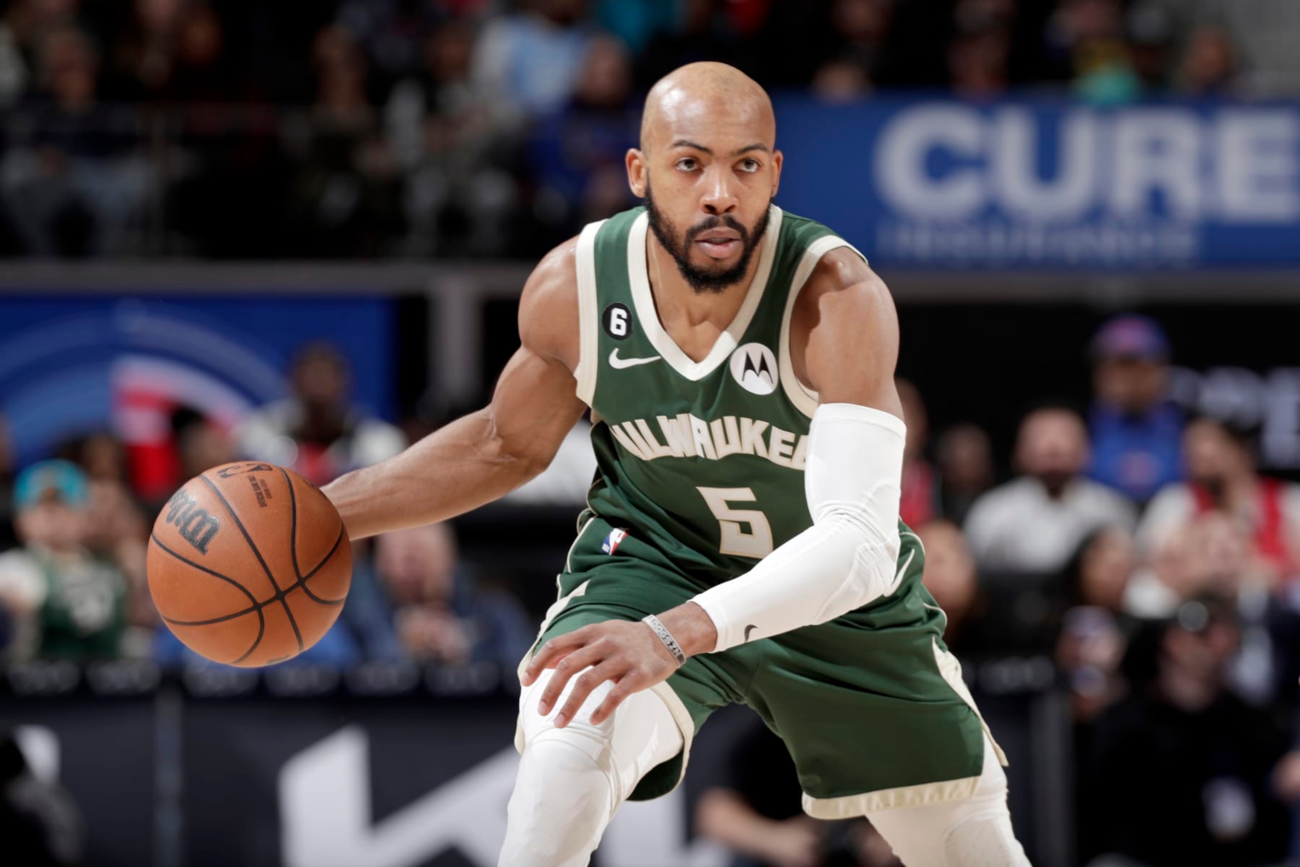DETROIT, MI - MARCH 27:  Jevon Carter #5 of the Milwaukee Bucks dribbles the ball against the Detroit Pistons on March 27, 2023 at Little Caesars Arena in Detroit, Michigan. NOTE TO USER: User expressly acknowledges and agrees that, by downloading and/or using this photograph, User is consenting to the terms and conditions of the Getty Images License Agreement. Mandatory Copyright Notice: Copyright 2023 NBAE (Photo by Brian Sevald/NBAE via Getty Images)