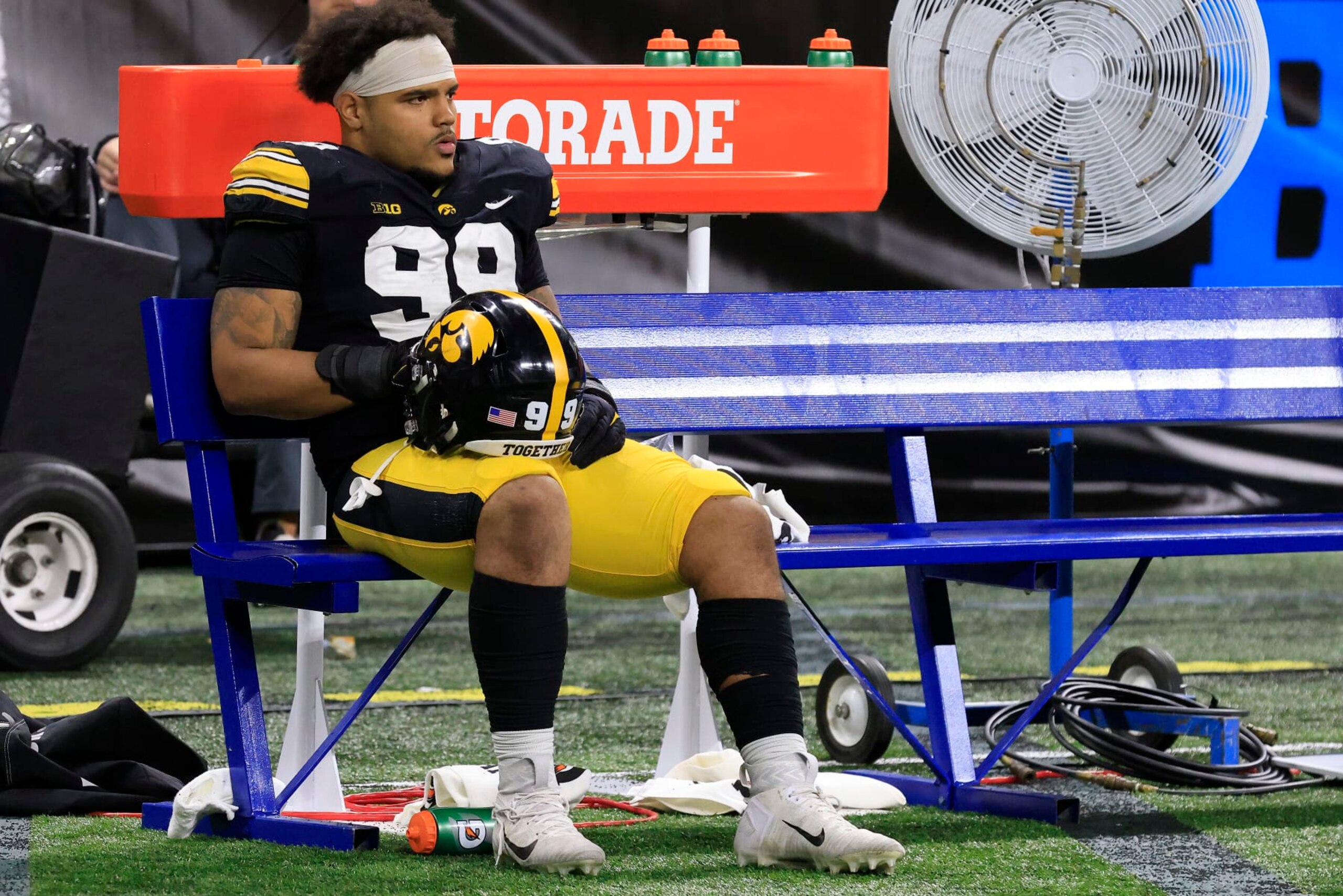 INDIANAPOLIS, INDIANA - DECEMBER 04: Noah Shannon #99 of the Iowa Hawkeyes sits on the sidelines after a loss to the Michigan Wolverines in the Big Ten Football Championship at Lucas Oil Stadium on December 04, 2021 in Indianapolis, Indiana. (Photo by Justin Casterline/Getty Images)